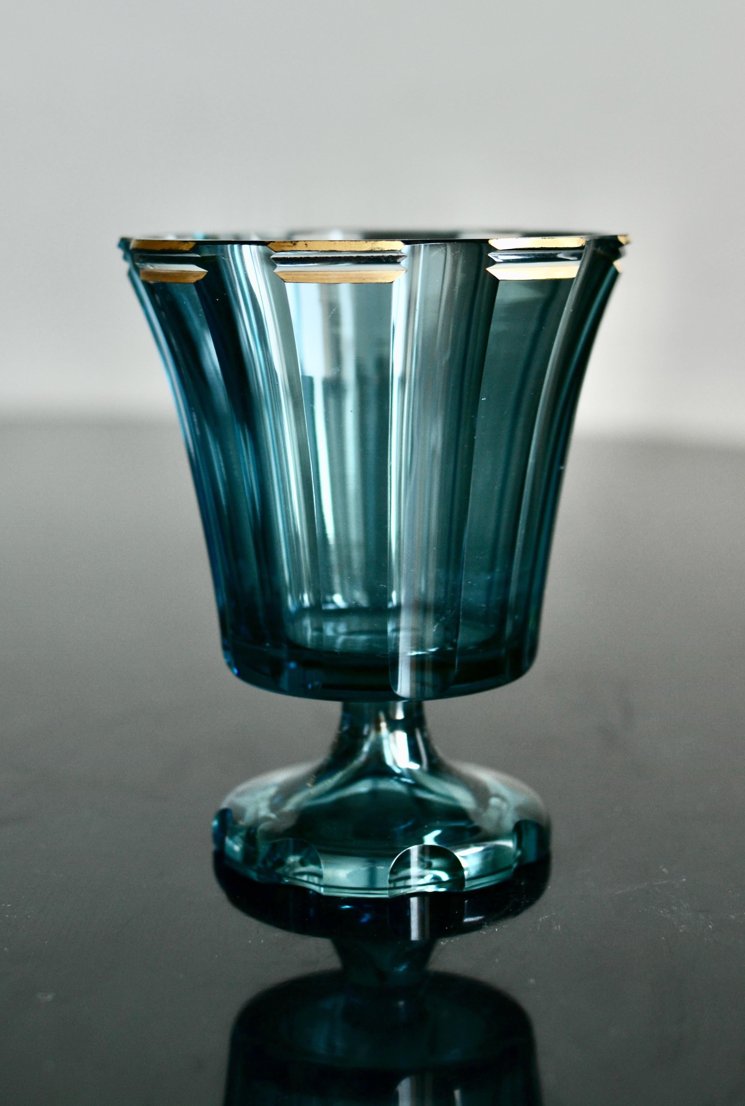 A very nice late 1920´s bluetoned glass bowl by Kosta after a design by Elis Bergh (1881-1954) Signed B305 Kosta on the bottom. Very nice condition. 

Elis Bergh, was an architect and designer, best remembered for his glass art and fixtures. His