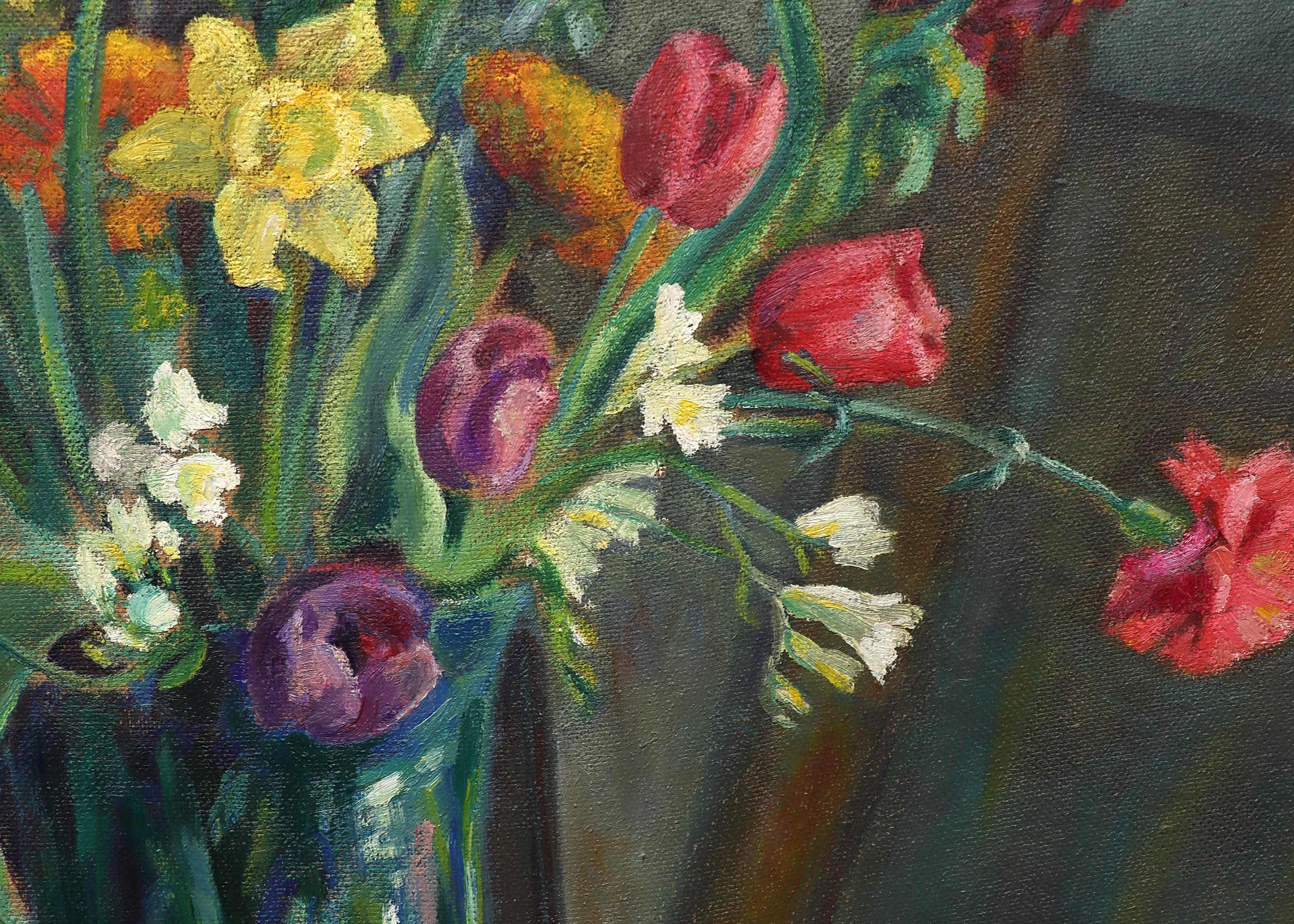Oil on board painting from February 14, 1933 titled 'Flower Arrangement' is a still life with daffodils, tulips and snapdragons by Colorado artist Elisabeth Spalding. Presented in a custom gold frame, outer dimensions measure 37 ⅛ x 41 ⅛ x 1 ¾