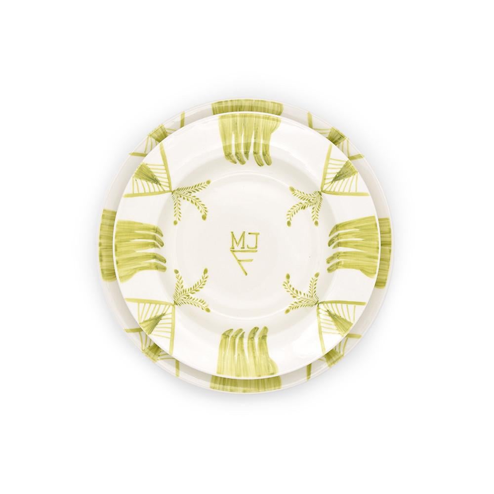 Set includes four dinner plates. The Quattro Mani by Julia B. dinnerware are based upon a mix and match series of several unique designs. Hand-painted by skilled artisans. 

Monogramming is optional and can be added for an additional $200.