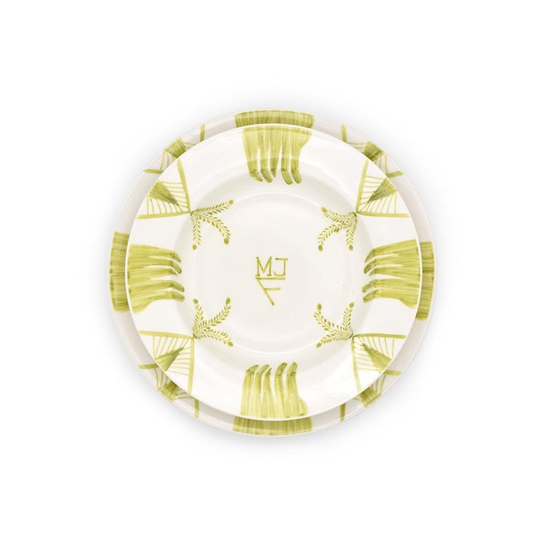 Set includes four dinner plates. The Quattro Mani by Julia B. dinnerware are based upon a mix and match series of several unique designs. Hand-painted by skilled artisans. 

Monogramming is optional and can be added for an additional $200.