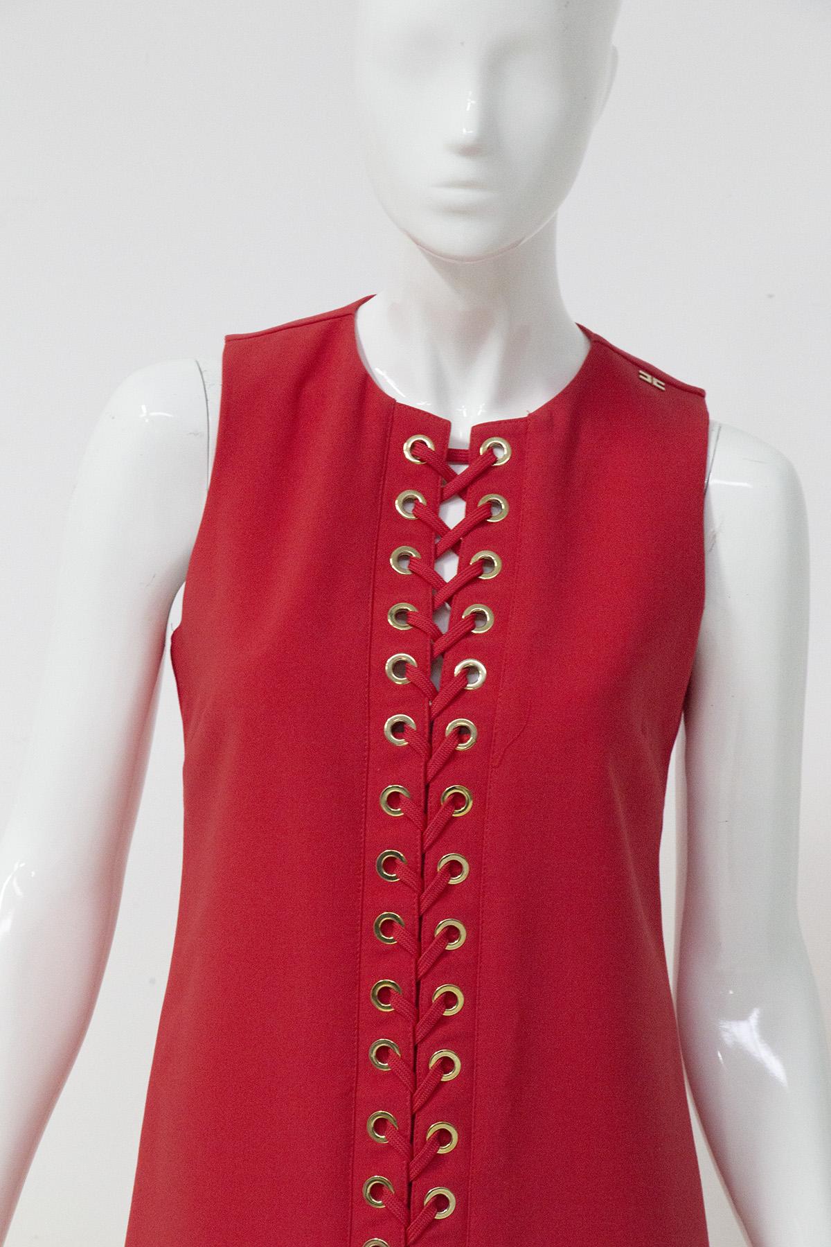 Gorgeous red dress designed by the great Italian stylist Elisabetta Franchi in the 1990s, of fine Italian manufacture. ORIGINAL LABEL.
The dress is very simple, thigh-length.
The dress is pre-fitted and closes with a zip at the back. The dress is a