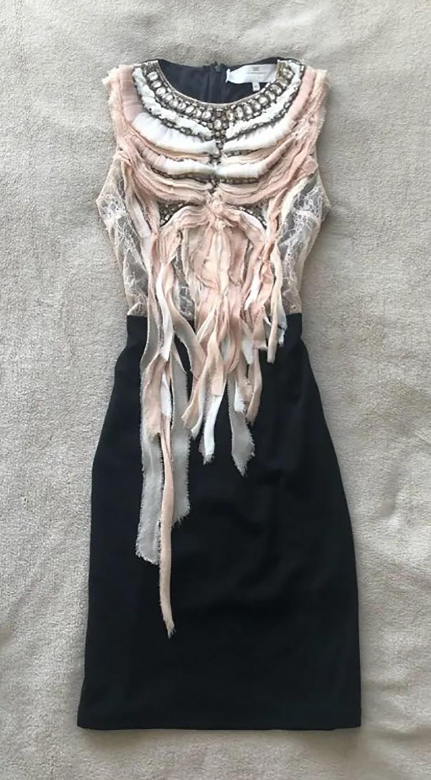 
ELISABETTA FRANCHI

Black and pink Elisabetta Franchi dress embellished with stones. 
Looks very impressive
Round neckline
Sleeveless
Mini

Content: 57% viscose, 35% polyamide, 8% elastane

Size IT 42 - US 6

Pre-owned in excellent condition

 100%