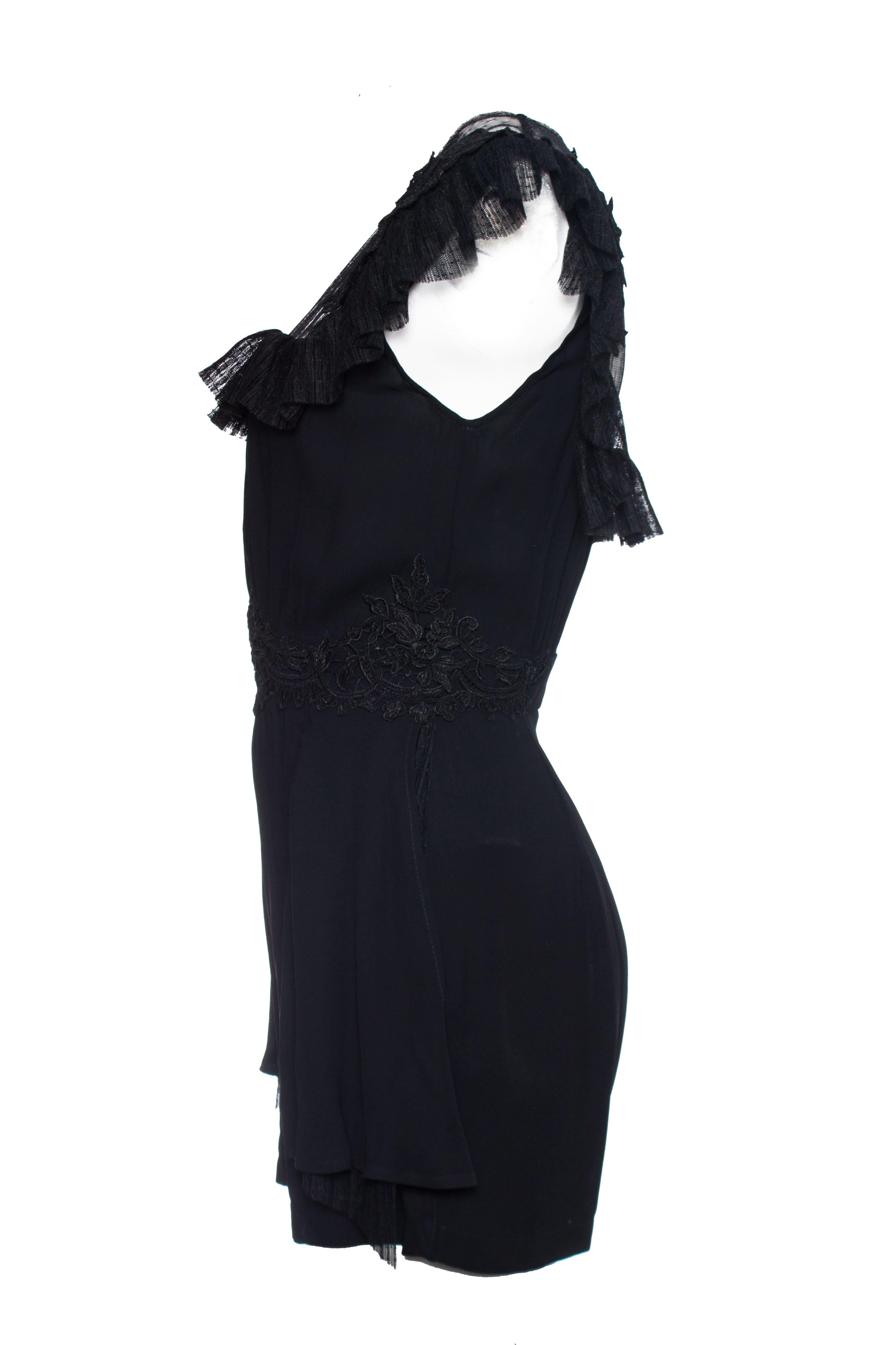 Elisabetta Franchi, Black Jumpsuit with tulle. The item is new with tags.

• CONDITION: new with tag

• SIZE: IT42 - S

• MEASUREMENTS: length 76 cm, width 41 cm, waist 33 cm, shoulder length 42 cm

• FABRIC: 100% viscose 100% polyester

• CARE: dry