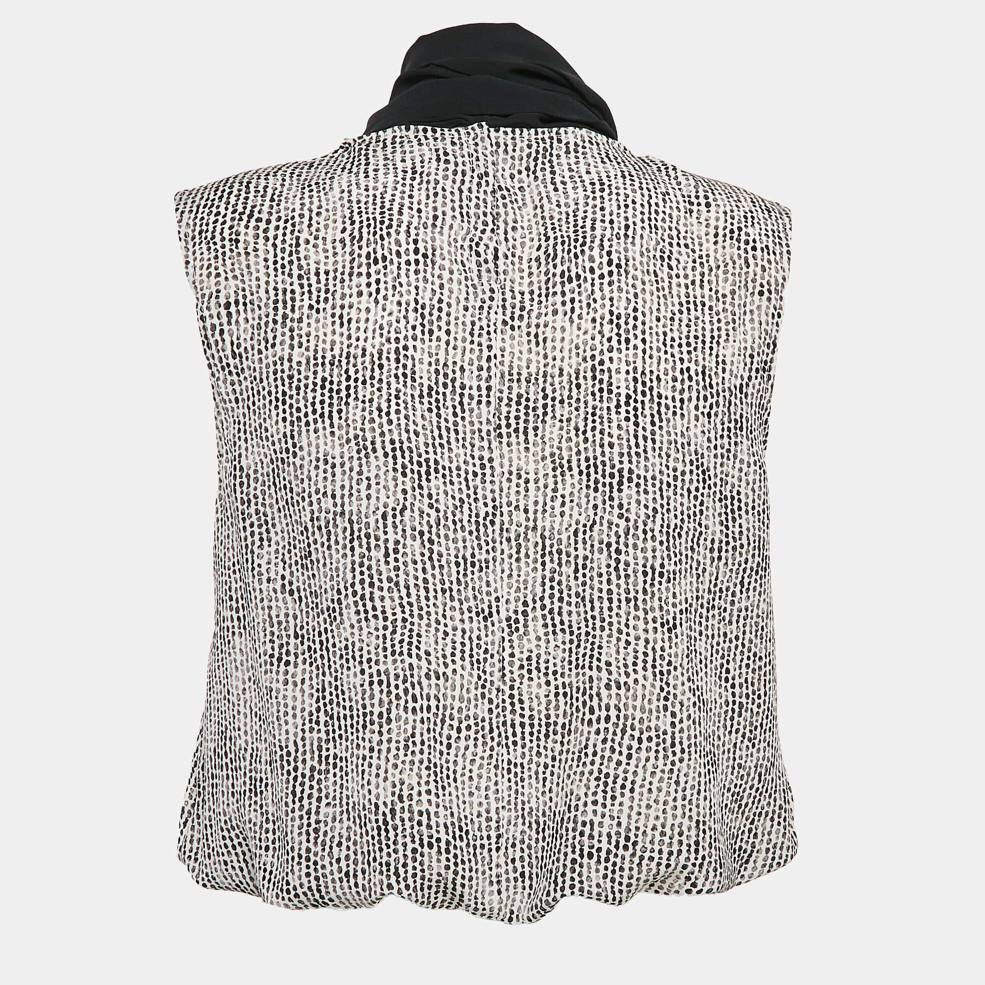 Find great style and comfort while wearing this designer top. Tailored using the best fabrics the creation has been given immense detail. Style it with a pair of jeans and flats.