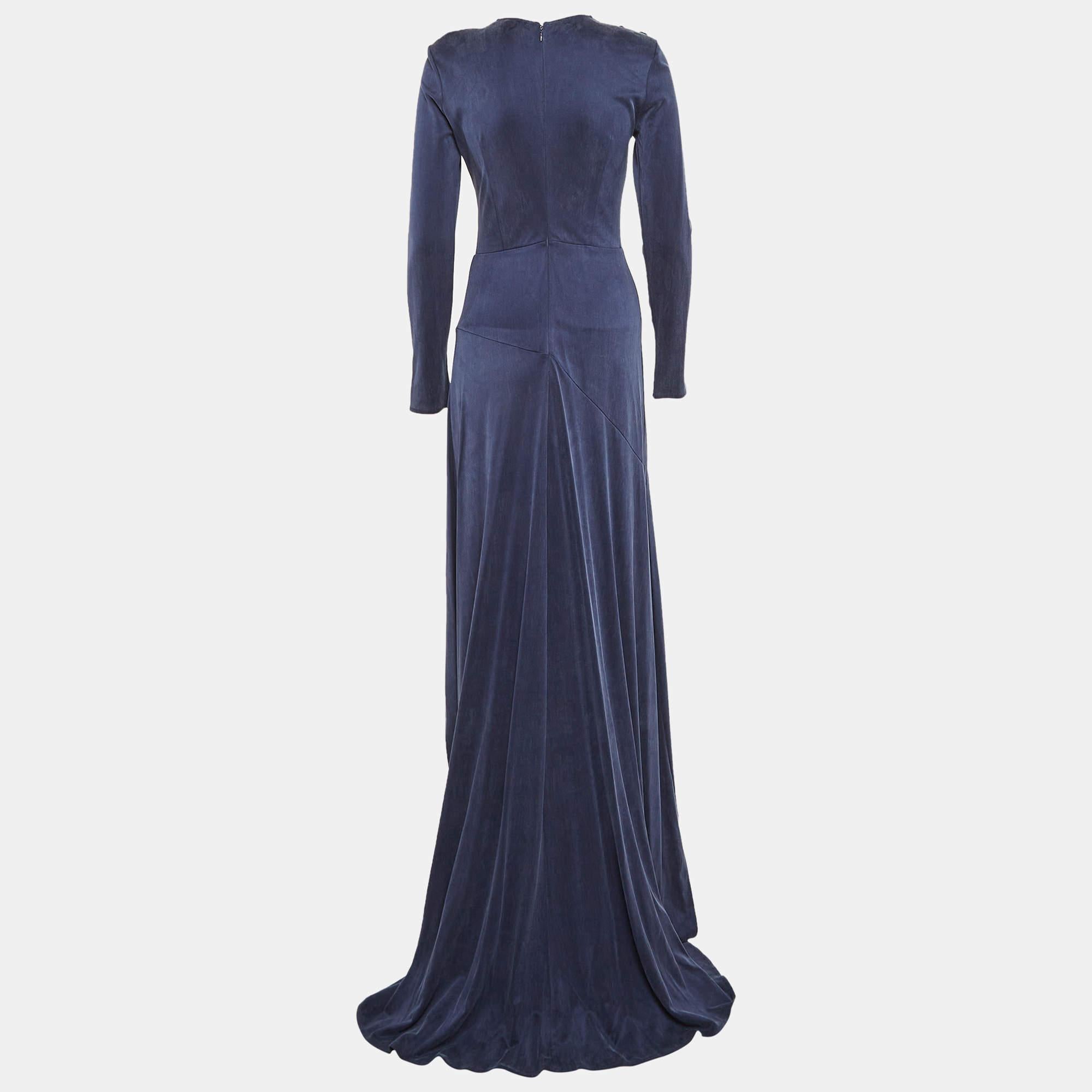 Exhibit a stylish look by wearing this beautiful designer dress. Tailored using fine fabric this dress has a chic silhouette for a framing fit. Style the creation with chic accessories and pumps.