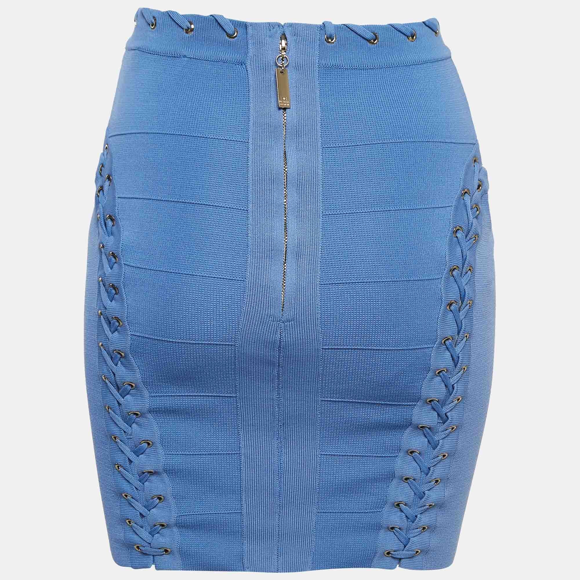 Make room in your closet for this creation from Elisabetta Franchi. Designed for a fashionable look this skirt is cut from knit fabric and it has laced eyelets and a back zipper.