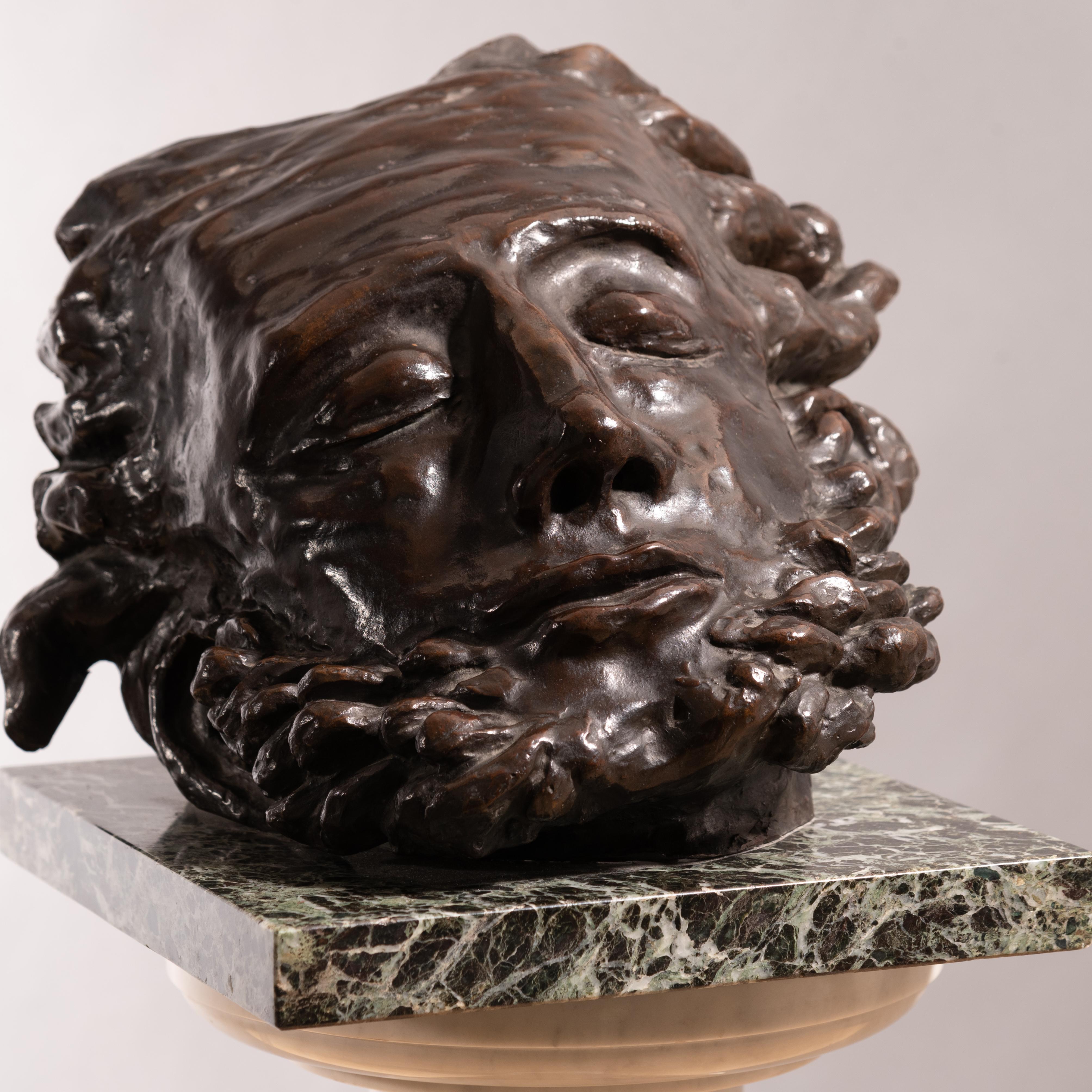Bronze on a marble base It bears Mayo's signature. 
 Trademark Fondart - Lagana Napoli.
“Of the first sculpture, a group of highly vigorous original artistry, all that remains is Adam's Mask “
This phrase is from a very rare 1929 pamphlet L'Abruzzo
