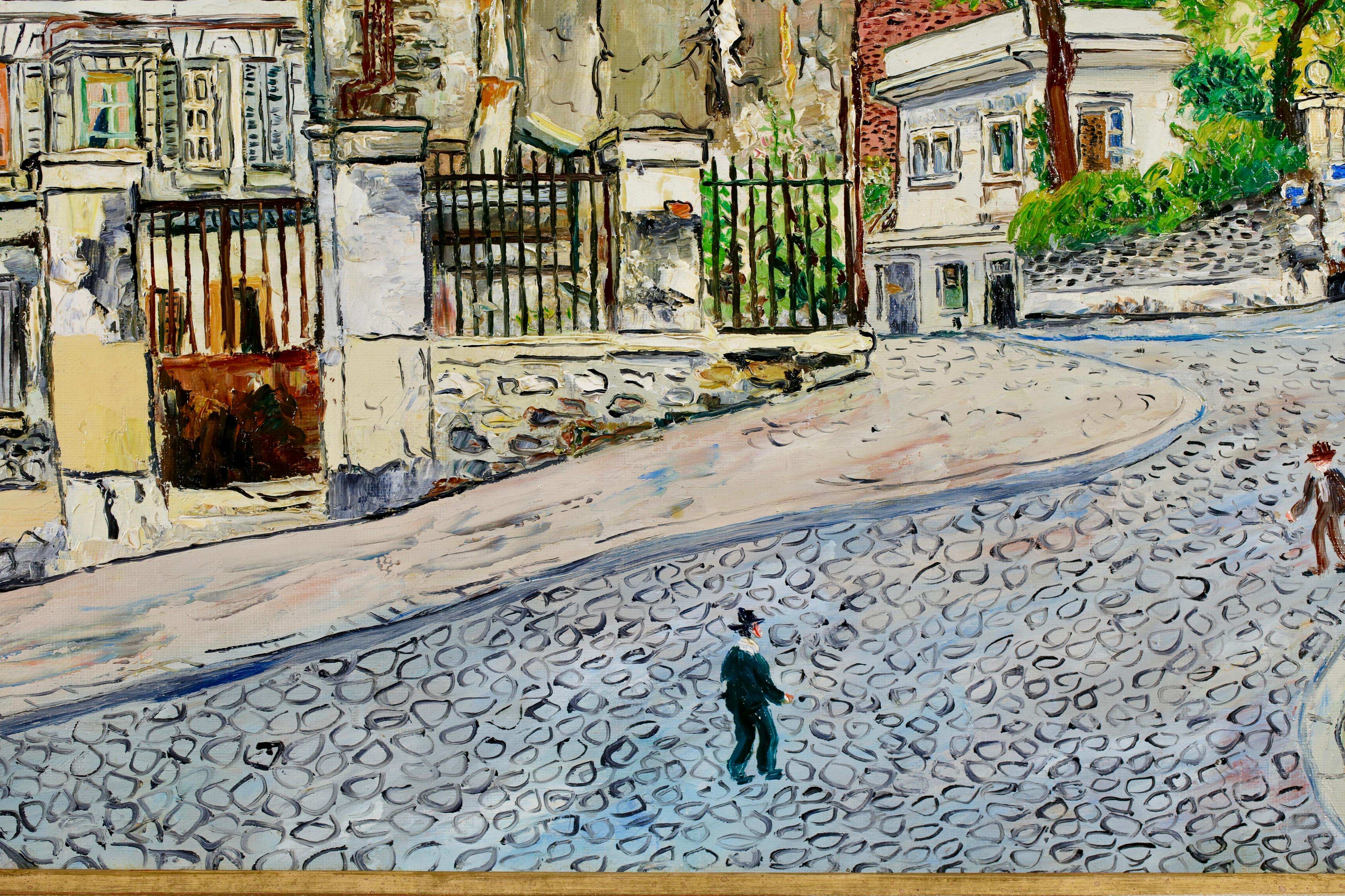 Huile sur toile signée de la peintre post impressionniste française Elisee Maclet. L'œuvre représente une vue des immeubles de la place Emile Goudeau dans le quartier de Monmartre à Paris. Deux messieurs marchent dans une rue pavée. Peint dans le