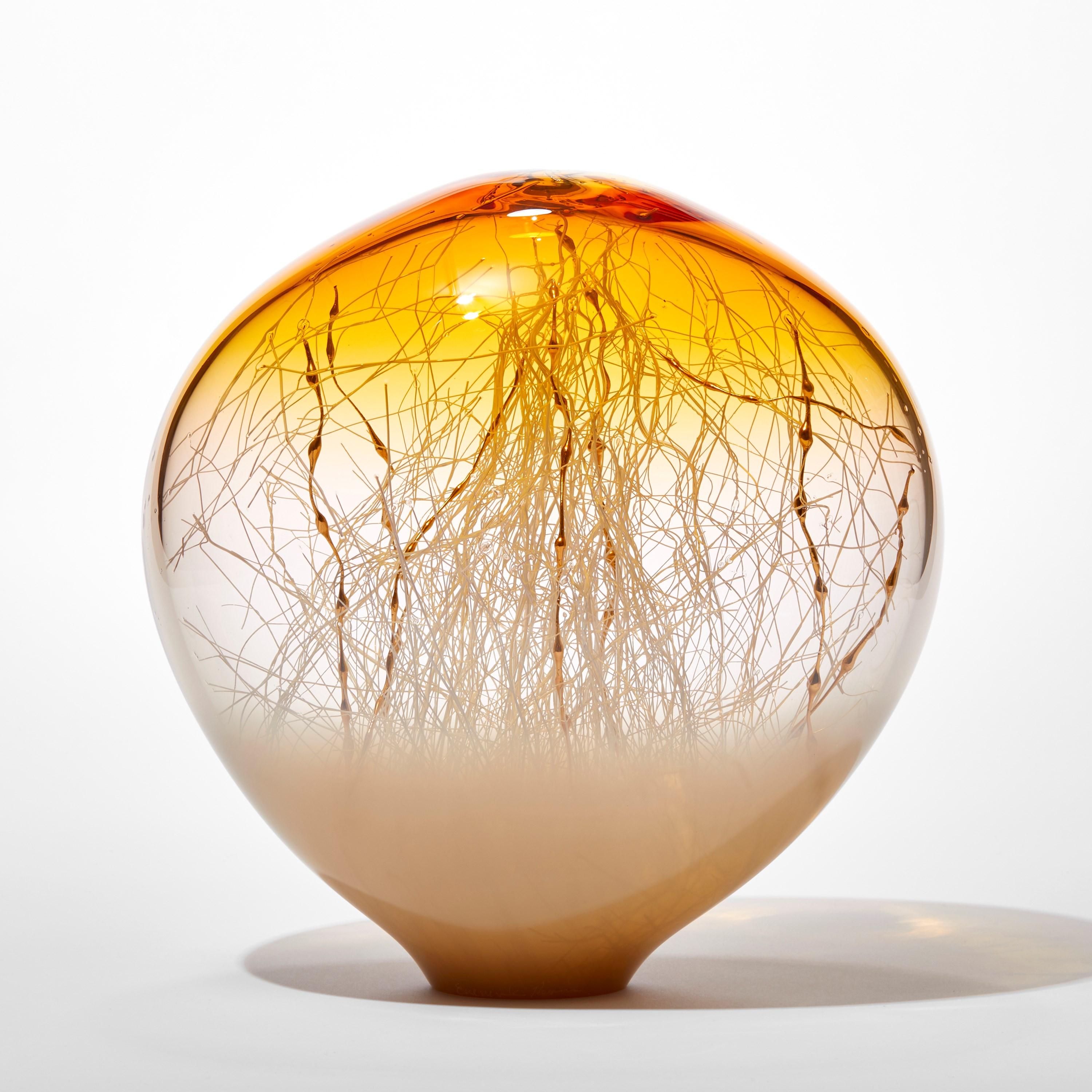 'Elixir in Weimaraner and Sunset Yellow' is a unique handblown and sculpted glass artwork by the Danish and British artists, Hanne Enemark & Louis Thompson.

The outer glass form contains a multitude of fine white canes of glass, some of which have