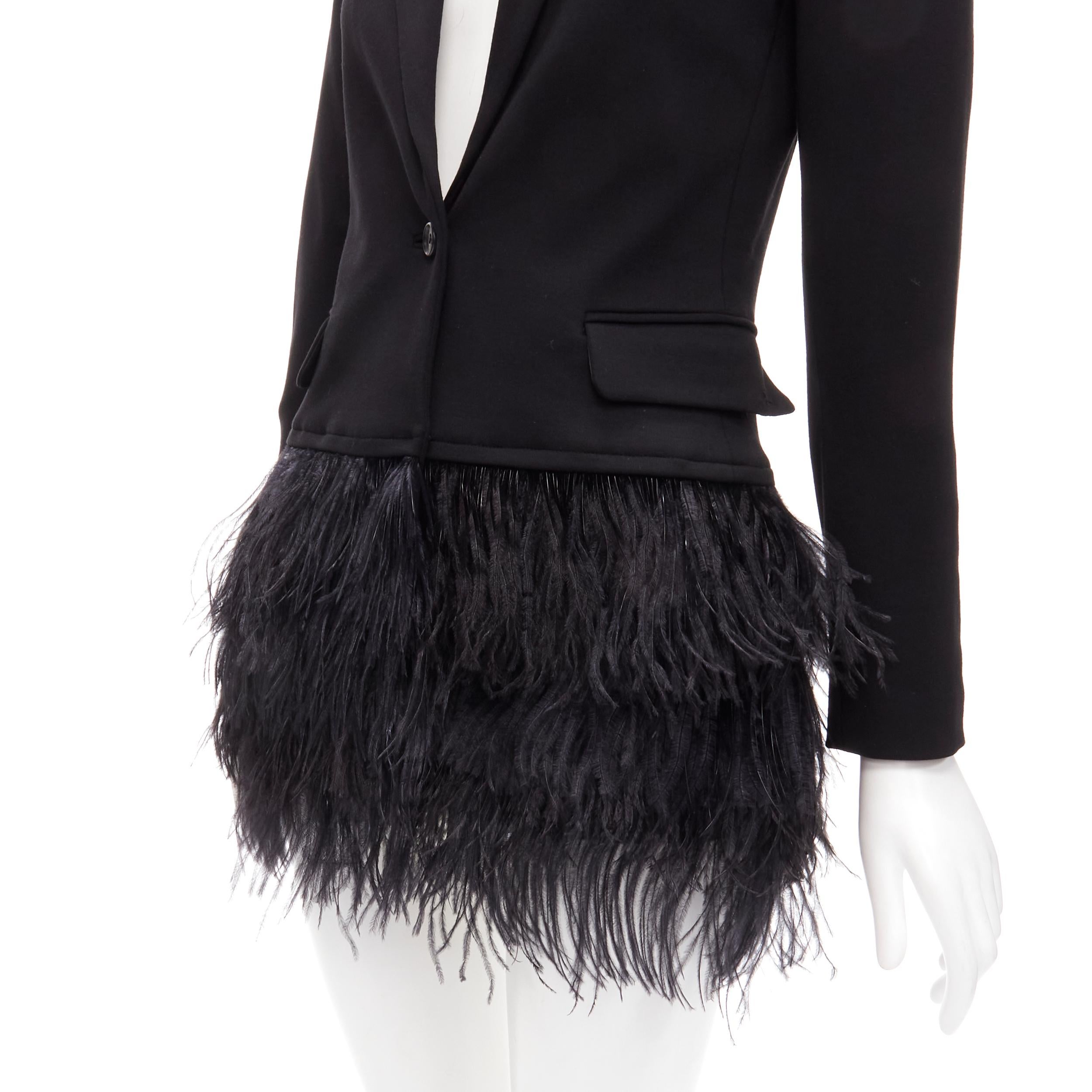 ELIZABETH ABD JAMES black ostrich feather hem blazer jacket XS 
Reference: ANWU/A00689 
Brand: Elizabeth James 
Material: Feels like polyester, feather 
Color: Black 
Pattern: Solid 
Closure: Button 
Extra Detail: Lightly padded shoulder. Single