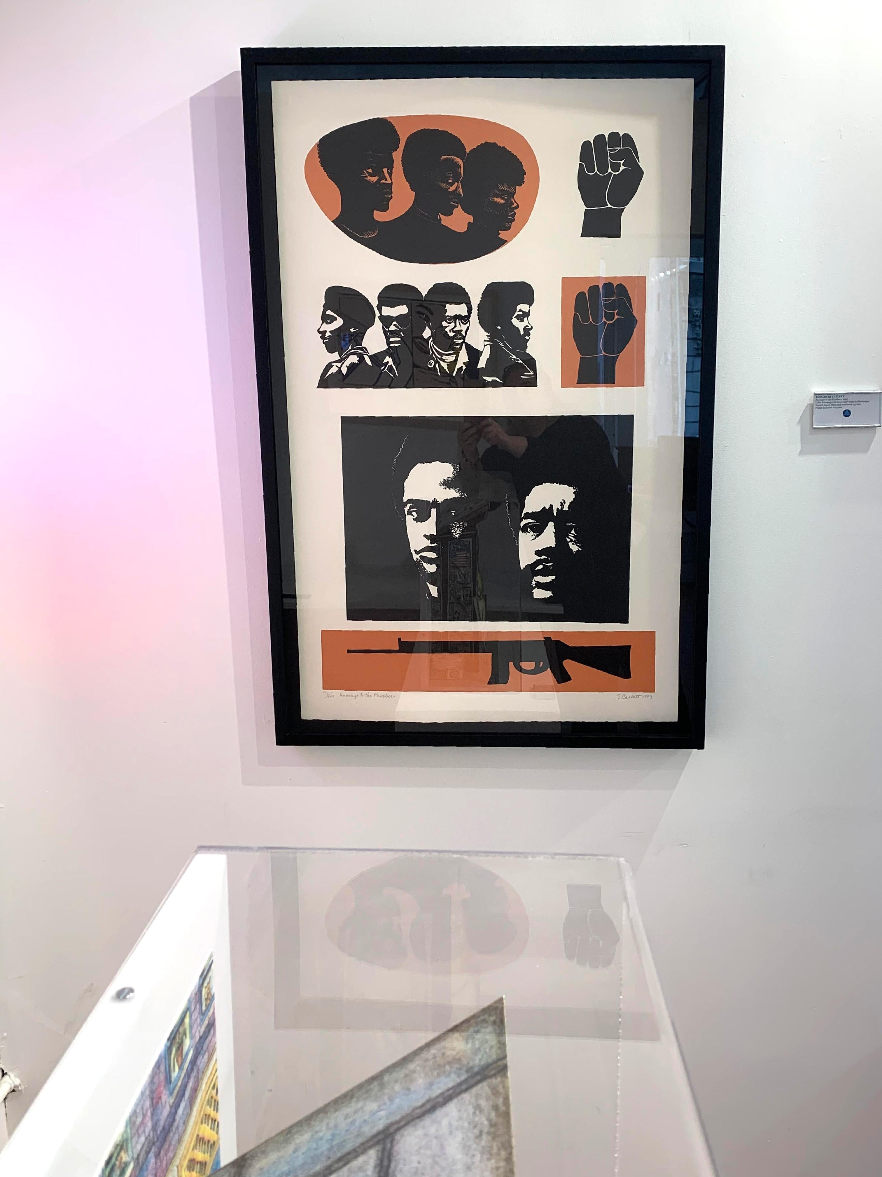Elizabeth Catlett
Homage to the Panthers, 1993
Color Lithograph on wove paper with deckled edges
Signed, titled and dated in graphite pencil on the front
Frame Included: elegantly floated and framed in dark wood museum quality frame under UV