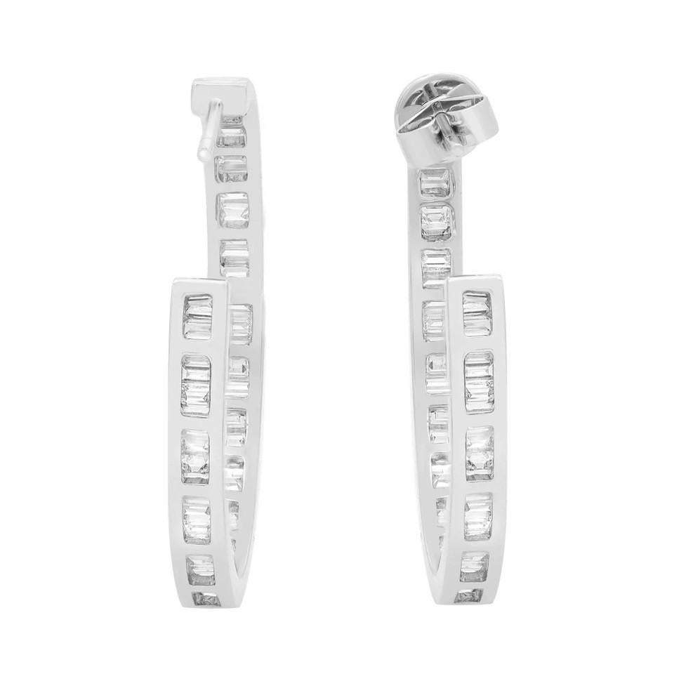 Introducing our exquisite 2.97 CT Baguette Cut Diamond Hoop Earrings in 18K white gold! Get ready to dazzle with these chic earrings that are a must-have for every fashion-forward individual. The sleek and modern hoop design, combined with the