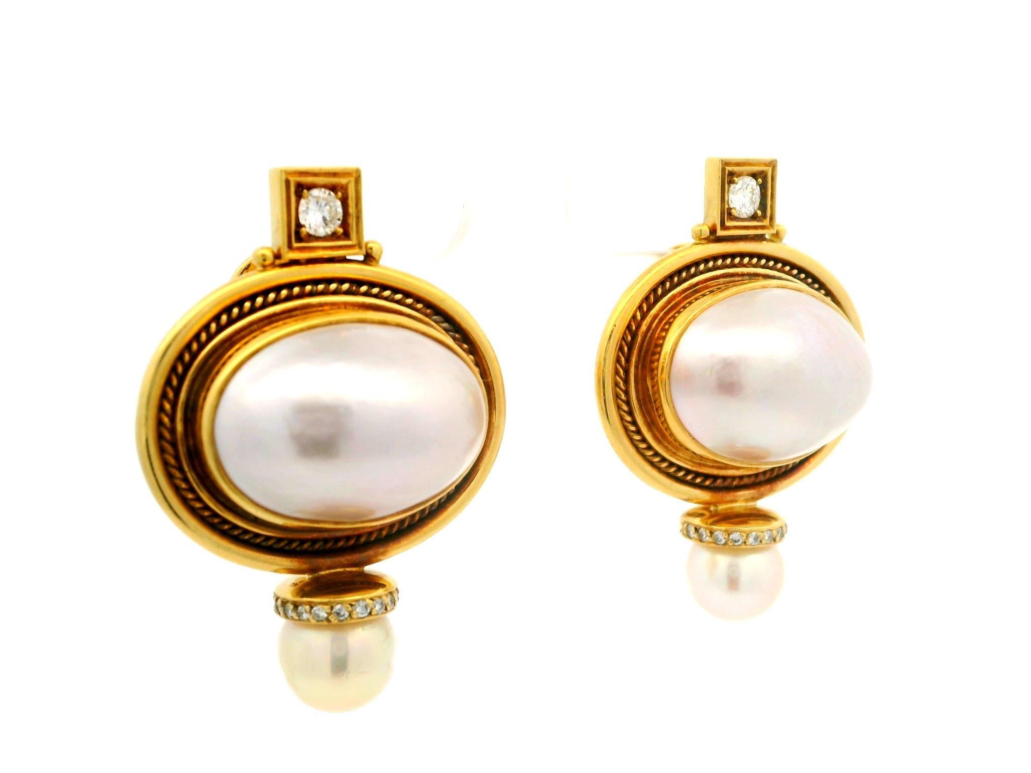--Stone(s):--
(2) Genuine Cultured Mabe Pearls - Oval Shape - Bezel Set - White Color w/ Pink Overtone - Very Nice Quality - 18.2x12.8mm each (approx.)
(2) Genuine Cultured Pearls - Round Shape - White Color w/ Golden Overtone - 7.6mm each