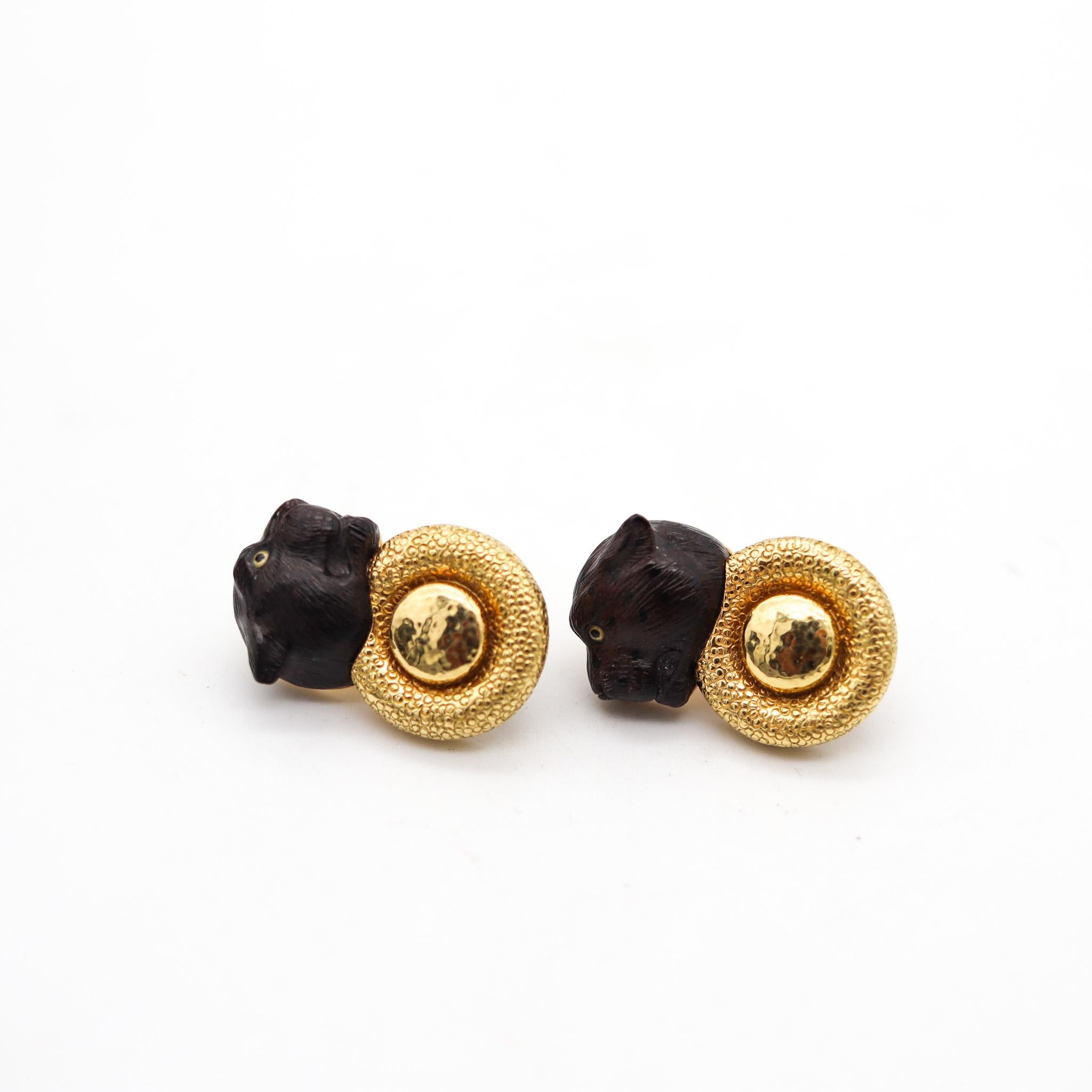 Pair of clips-earrings designed by Elizabeth Gage.

Gorgeous vintage pair of earrings, created by the British jewelry designer Elizabeth Gage, back in the 2005. These clip-on earrings was carefully crafted as a left and right, with Etruscan revival