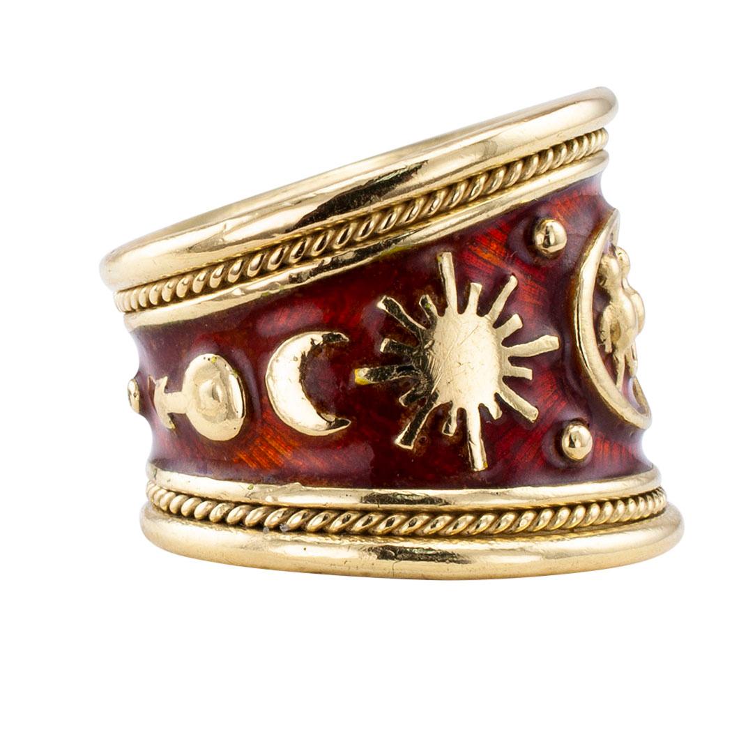 Elizabeth Gage enamel and gold Gemini cigar band ring circa 2000. The astrologically inspired design is entirely decorated by symbols for Gemini and a host of other astrologically appropriate symbology, all in relief, on a base of reddish-chestnut