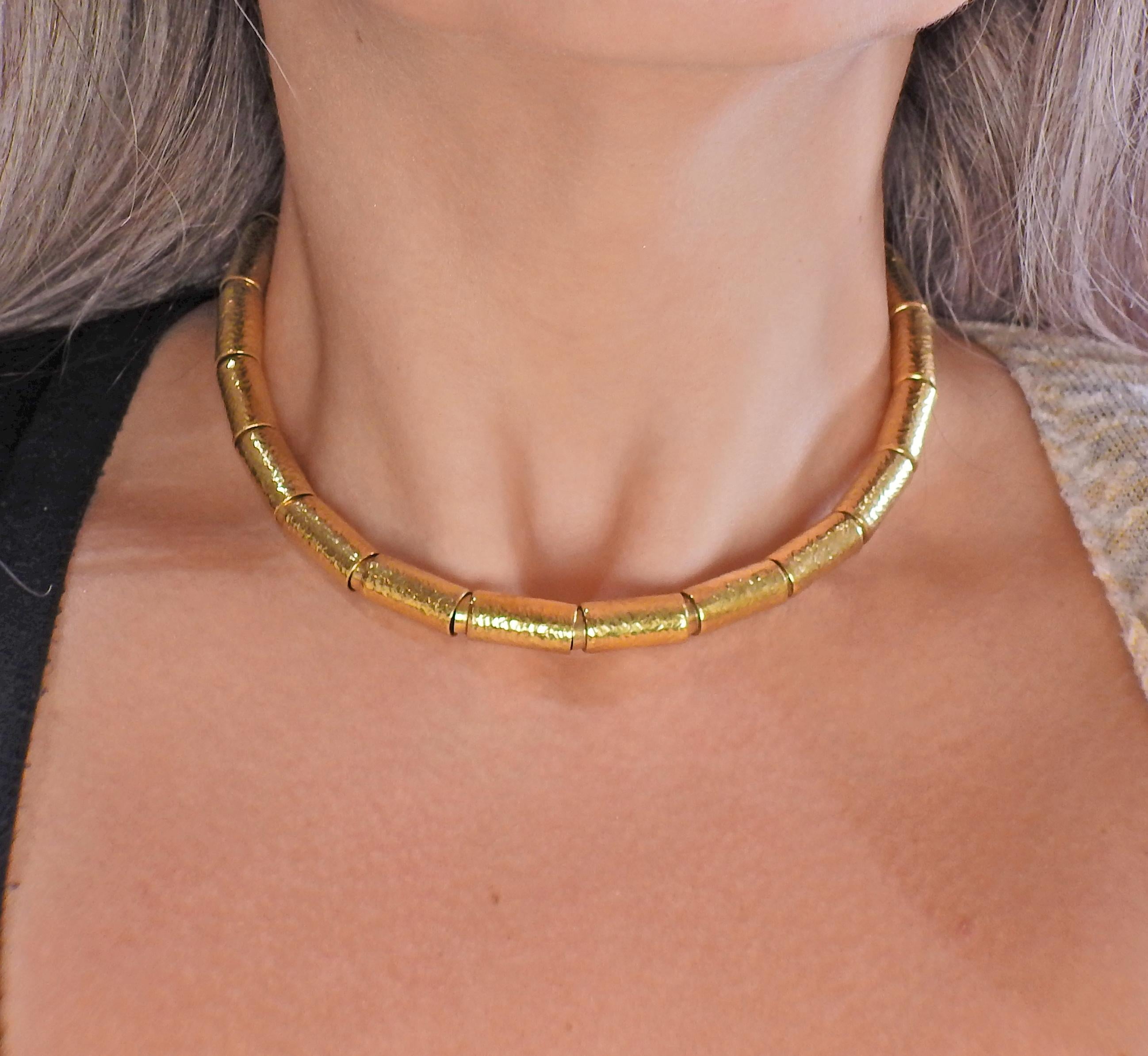 Elizabeth Gage molten gold tube necklace, consisting of 22 tubes. Current retail of a small version of the necklace with 16 tubes is $24300. Necklace is 15.5