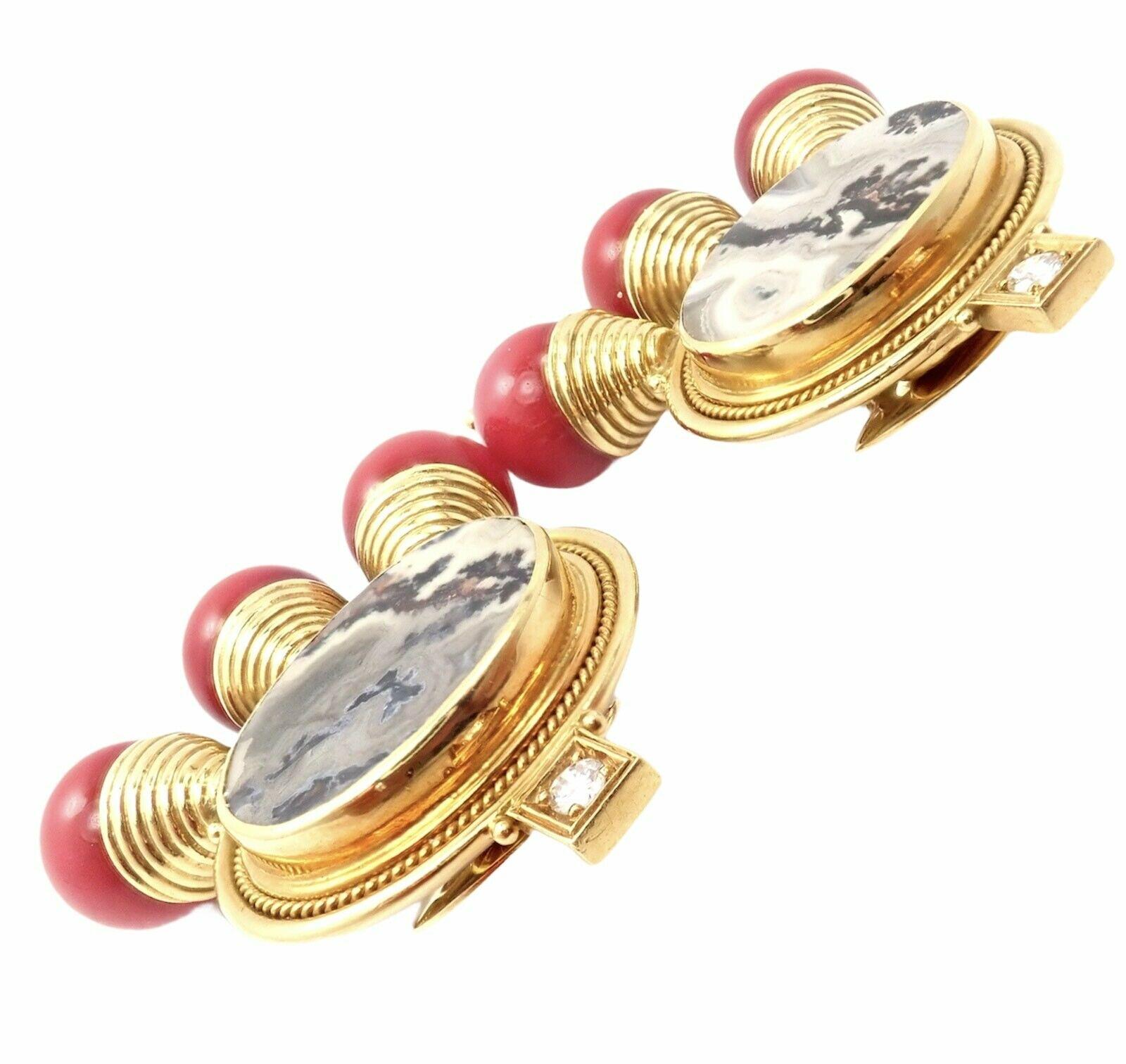 18k Yellow Gold Ebony Wood And Watermelon Tourmaline Earrings by Elizabeth Gage. 
With 2 round brilliant cut diamonds VS1 clarity, G color.
2x Agates: 21mm x 16mm
6x Red Cora Beads 7mm each.
Details:
Measurements: 40mm x 49mm
Weight:  61.4