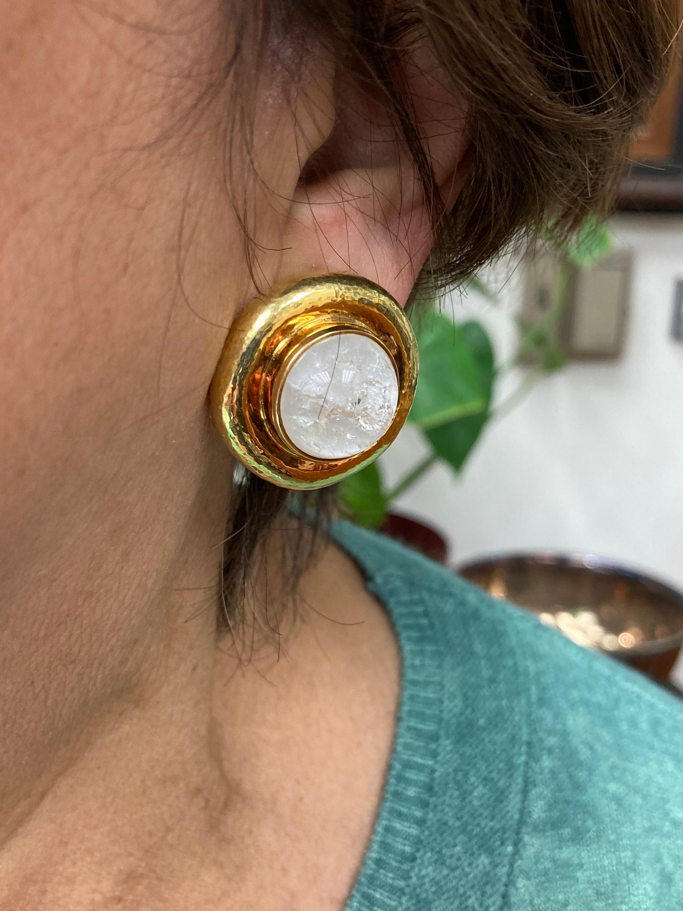 Elizabeth Gage rock crystal and yellow gold round clip-on earrings circa 2001. *

The Elizabeth Gage Rock Crystal and Yellow Gold Round Clip-On Earrings, created circa 2001, epitomize the intersection of artistry and craftsmanship in contemporary