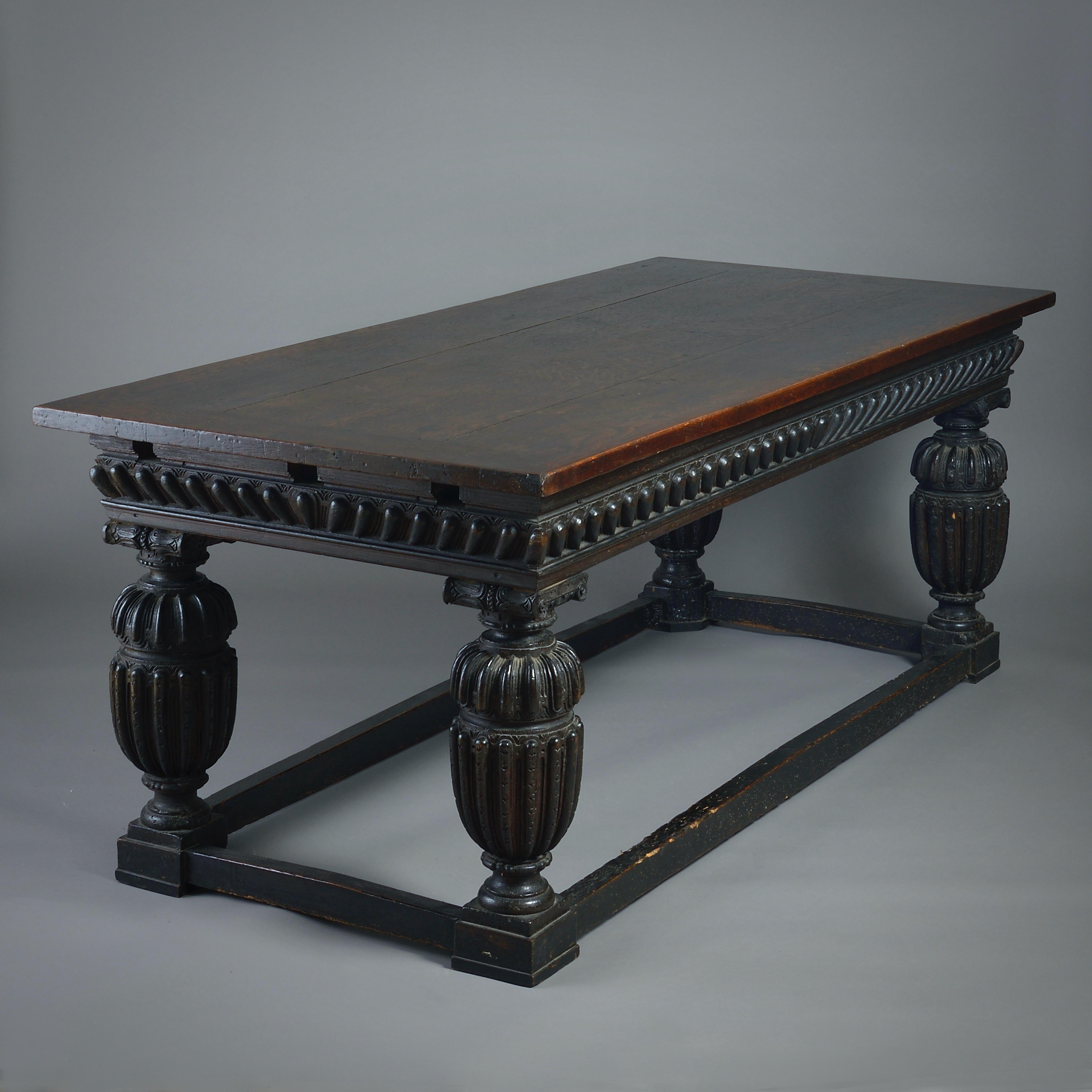 AN ELIZABETH I OAK TABLE, CIRCA 1580.

With gadrooned frieze and massive baluster legs with ionic capitals. Previously a draw-leaf able, lacking extending leaves. The stretchers 18th Century.

