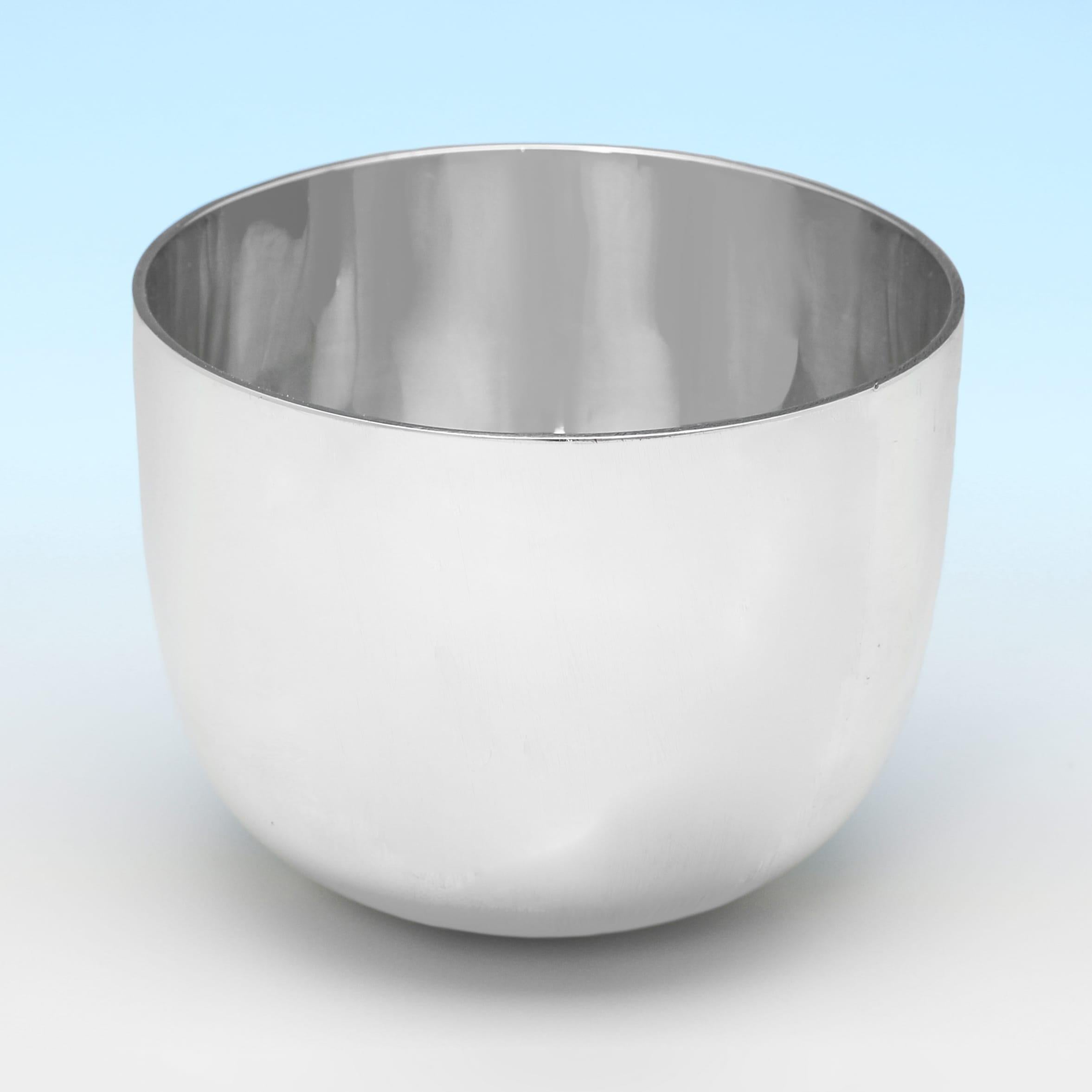 Hallmarked in London in 1978 by Spink & Son, this handsome, Elizabeth II period, Sterling Silver Tumbler Cup, is plain in design, and of traditional form. The tumbler cup measures 2.5