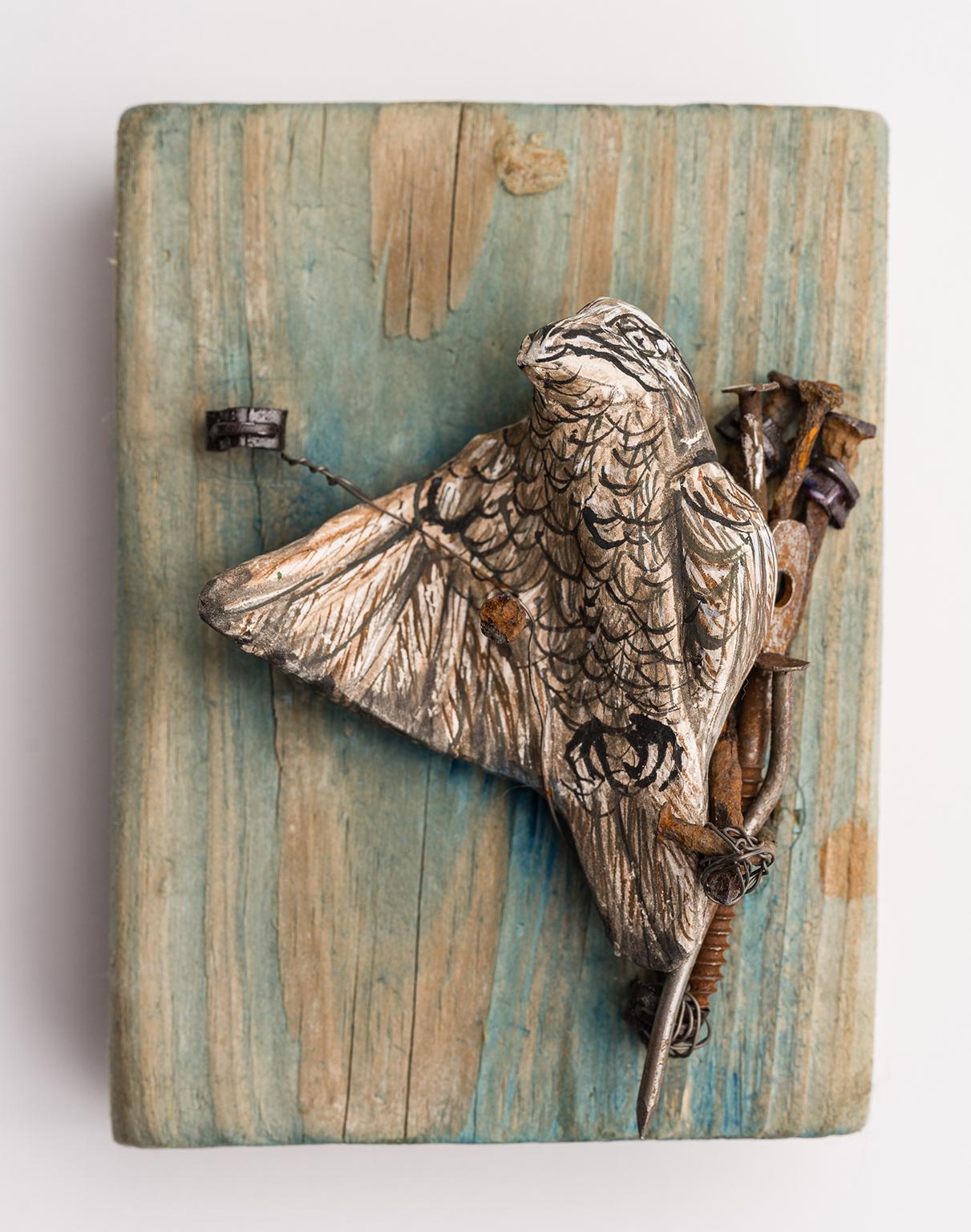 Elizabeth Jordan Figurative Sculpture - Sculpture of birds mounted on wood plank: The Ghost of Christmas Past'