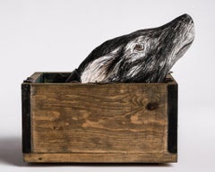 Sculpture of Deer head in wood box: 'Free me from the earth'