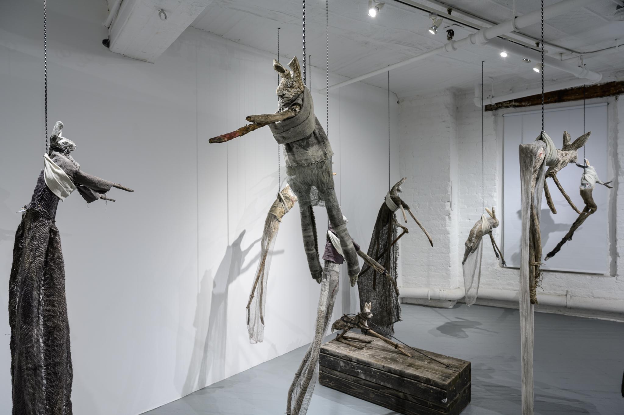 Sculpture of hare suspended from chain: 'Children 10' - Contemporary Mixed Media Art by Elizabeth Jordan