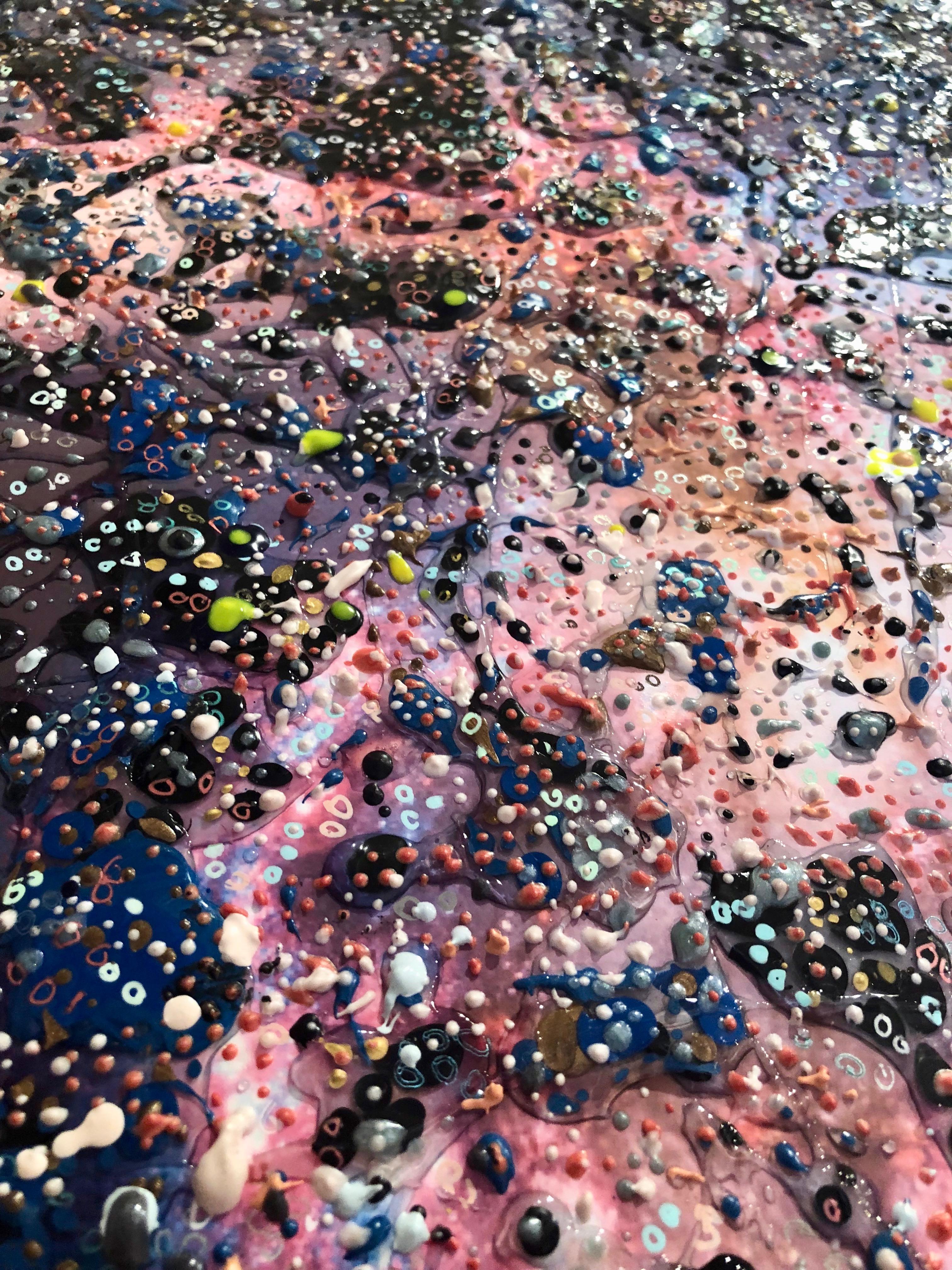 Space pinks, blues and black suggests a cosmic explosion, inspired by Hubble telescope’s images of the birth of galaxies.The artist draws on biological patterns on the cellular level and geological patterns of earth's terrain. Exploring