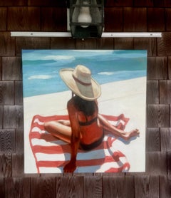 "Poolside 2" woman with a beach hat sits on a towel by the pool, her back to us