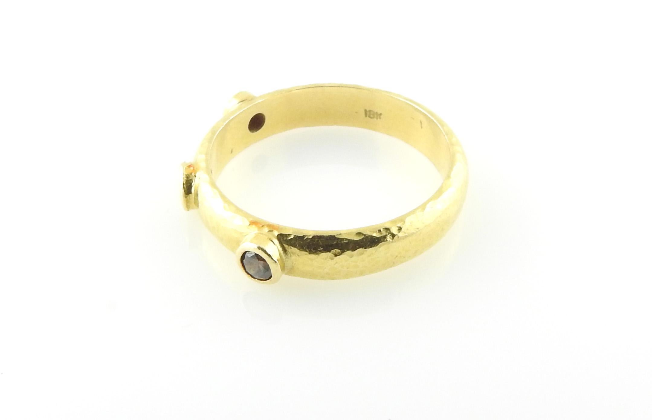 Elizabeth Locke 18K Hammered Yellow Gold Diamond Stacking Band

This Elizabeth Locke stacking band is set in hammered 18K yellow gold.

The band is approx. 4mm wide and 1.5mm thick

3 bezel set brown diamonds are set in the front of the ring.

Size