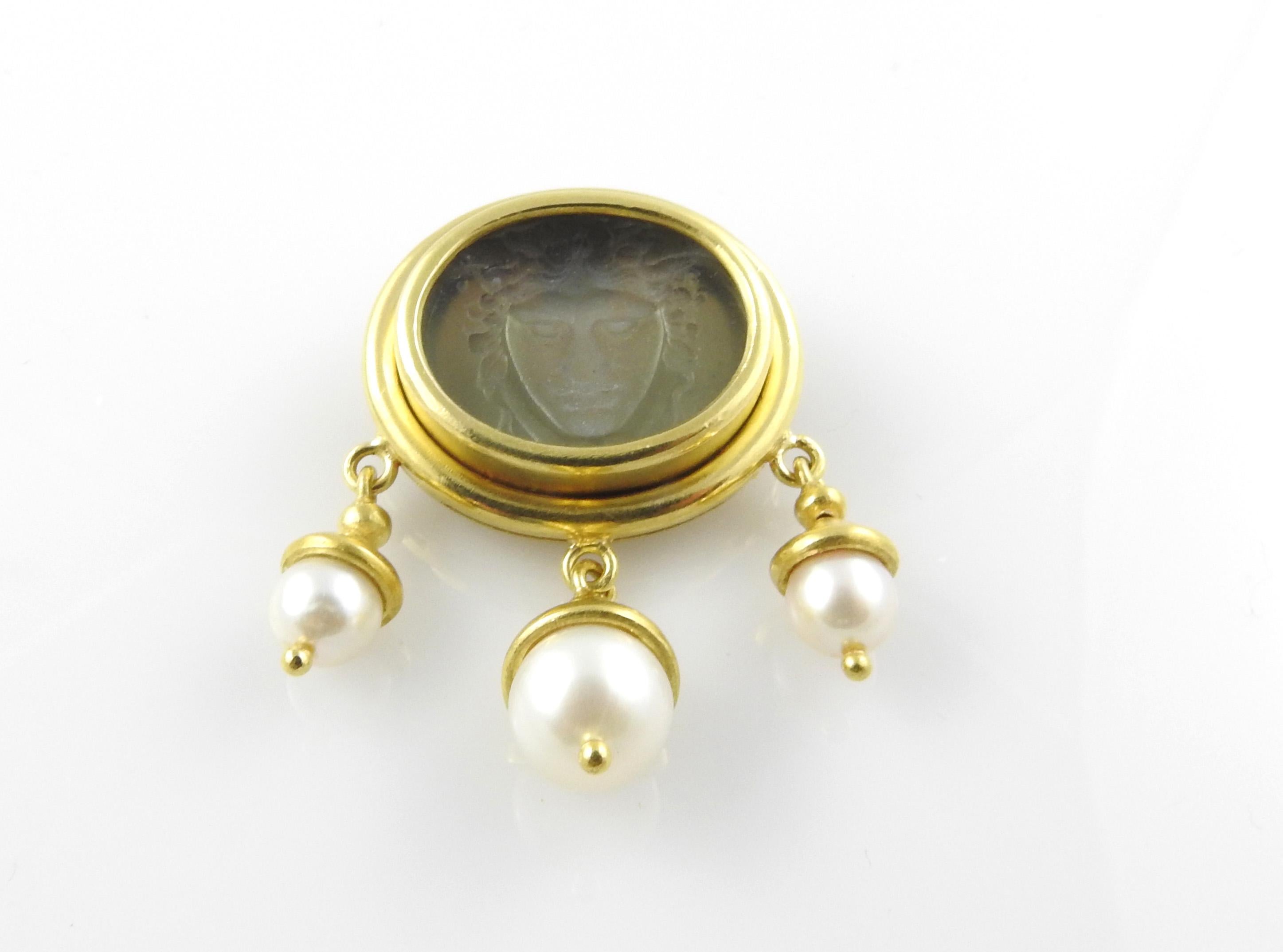 Elizabeth Locke 18K Yellow Gold Green Venetian Glass Pearl Intaglio Brooch / Pendant

This beautiful piece can be worn as a brooch or a pendant.

The oval brooch / pendant is set with an oval intaglio design of a goddess set in Venetian green glass.