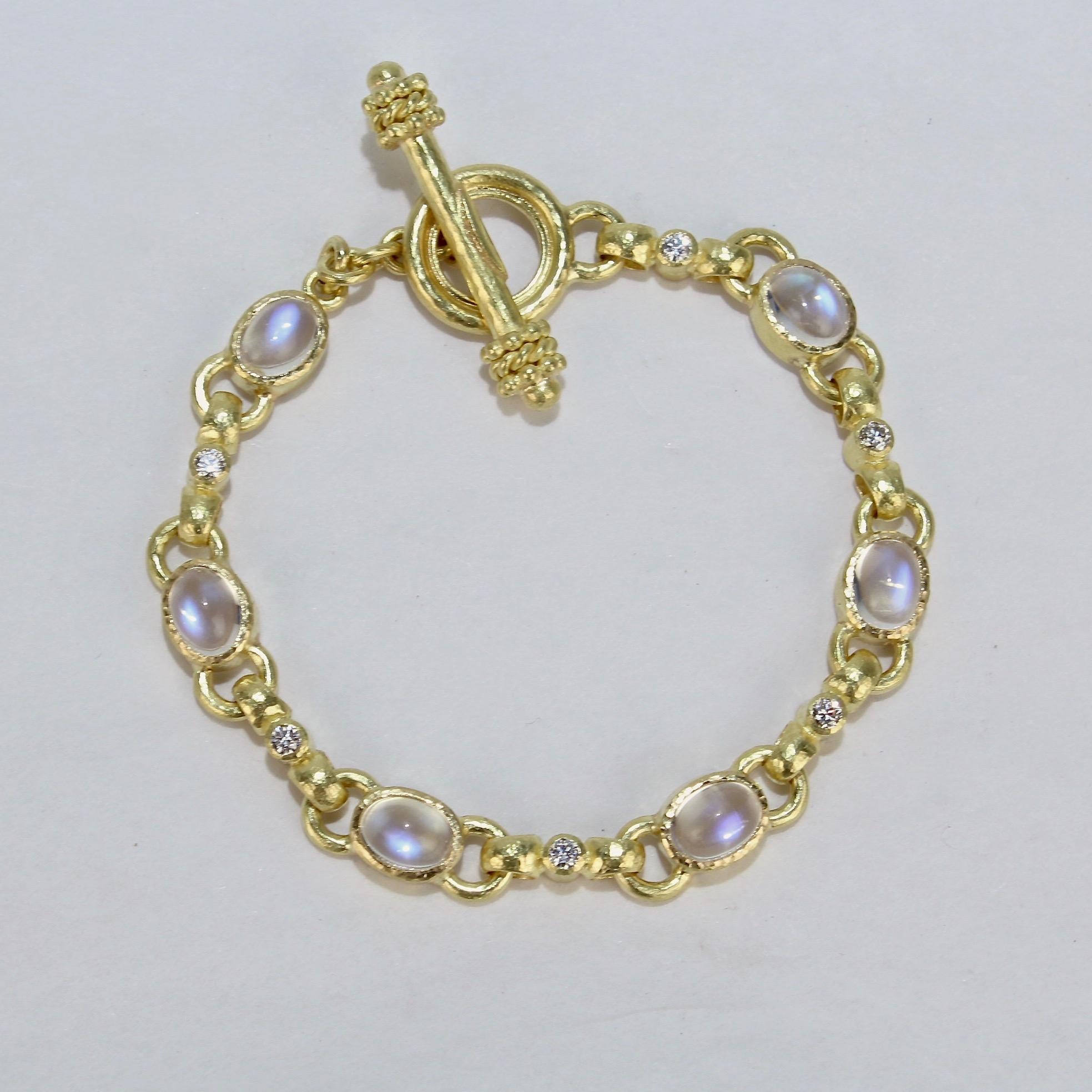 A very fine Elizabeth Locke fancy-link toggle bracelet.

With hand hammered fancy links in burnished gold set with 6 moonstone cabochon gemstones and 6 round cut white diamonds.

It feels simply wonderful on the arm!

Marked to the T bar with the EL