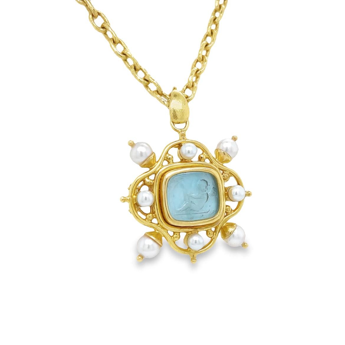 Beautiful necklace crafted by famed designer Elizabeth Locke. This elegant necklace is crafted in 19k yellow gold and features a Venetian glass and Pearl carved intaglio pendant. It is an exquisitely crafted piece of jewelry that seamlessly combines