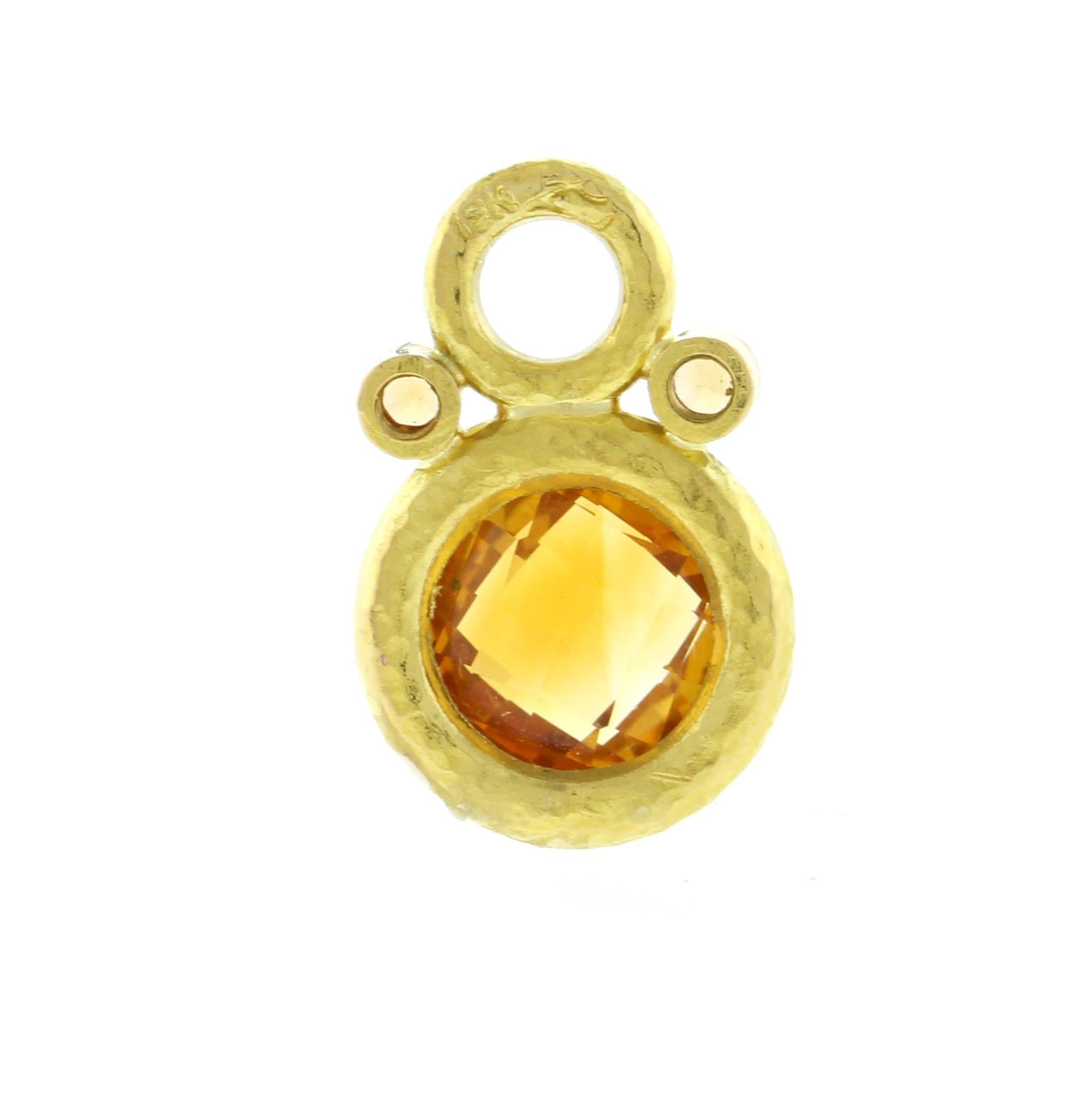 Transform your look with these elegant Elizabeth Locke citrine and spessartite earring charms. Crafted from 19kt yellow gold, each charm features two dazzling spessartites and a vibrant citrine. The hammered finish adds a touch of texture and
