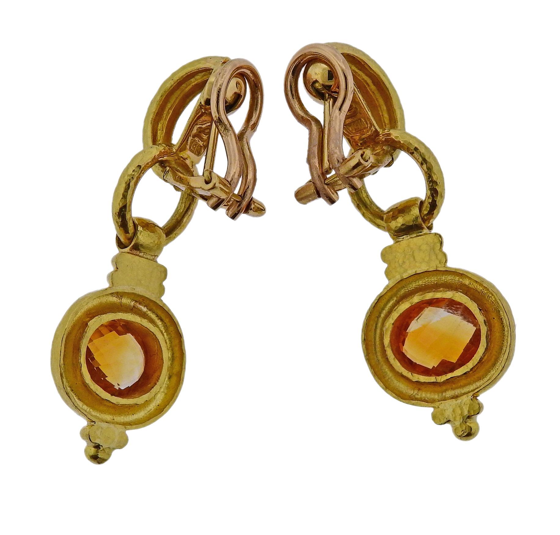 Pair of signature 19k yellow gold drop earrings, designed by Elizabeth Locke, set with faceted citrines. Earrings are 43mm long x 16mm wide (with collapsible posts). Earrings weigh 18.1 grams, marked 19k, E Locke mark.
