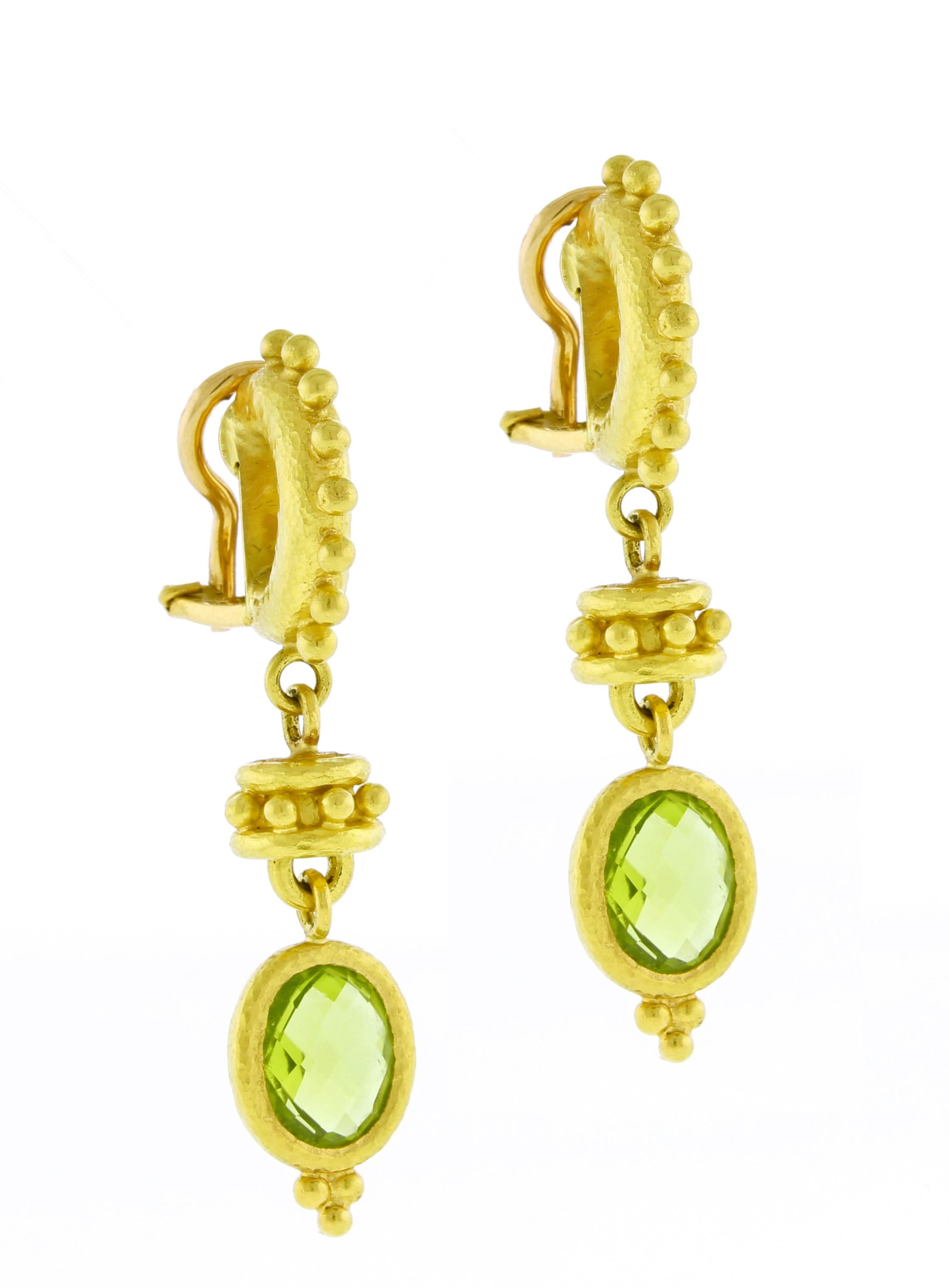From Elizabeth Locke, her curved hoop earrings with large granulation and oval peridot drops.
♦ Designer: Elizabeth Locke
♦ Metal: 19 karat
♦ Gem stone: Peridot 9 X 7 mm 
♦ Circa 2010
♦ Size  1 5/8 inches
♦ Packaging: Pampillonia presentation box 
♦