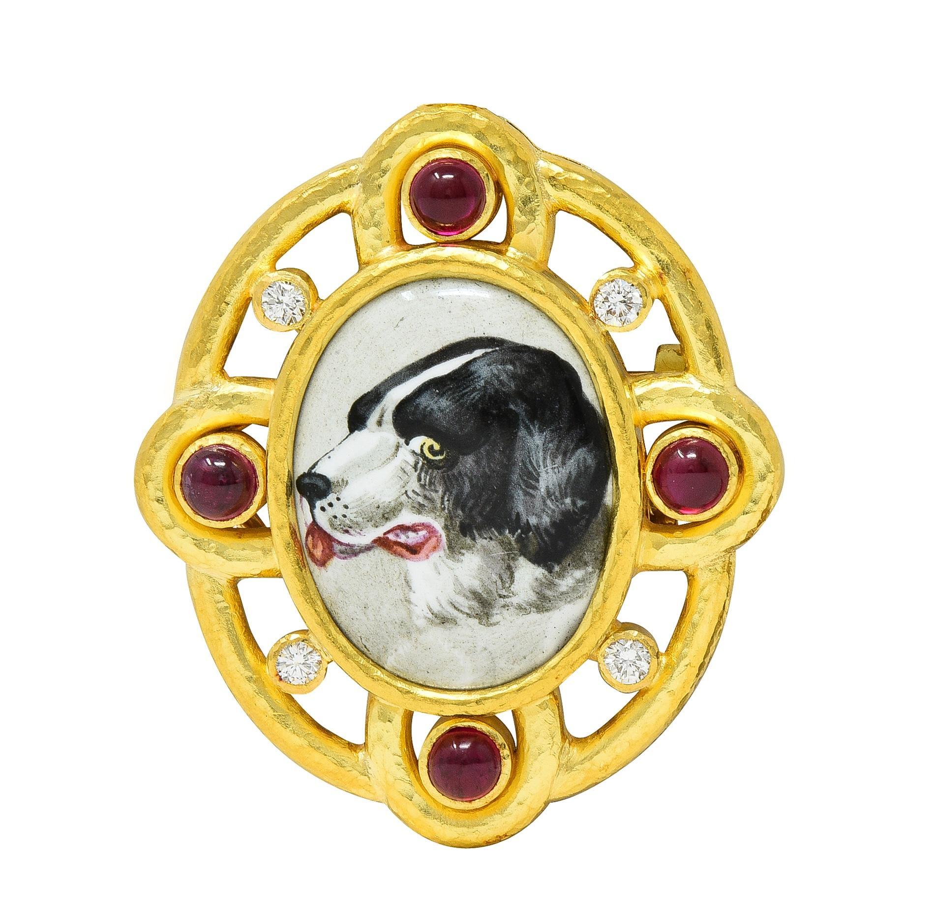Centering an oval-shaped enamel portrait of a dog measuring 16.0 x 22.0 mm 
Opaque white, black, red, pink, and gray with gloss finish - no loss
Backed by white iridescent mother-of-pearl and bezel set
With a pierced radial surround and ruby