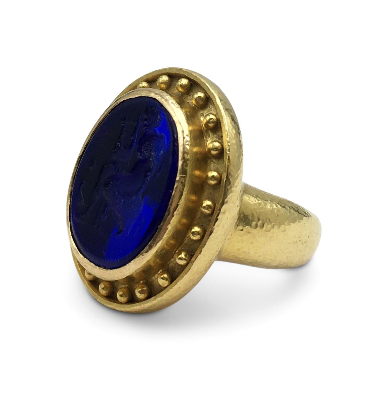 Authentic Elizabeth Locke ring crafted in 18 karat gold centers on an intaglio carved from Venetian glass. Ring size 5. Not presented with original box or papers. CIRCA 2010s.