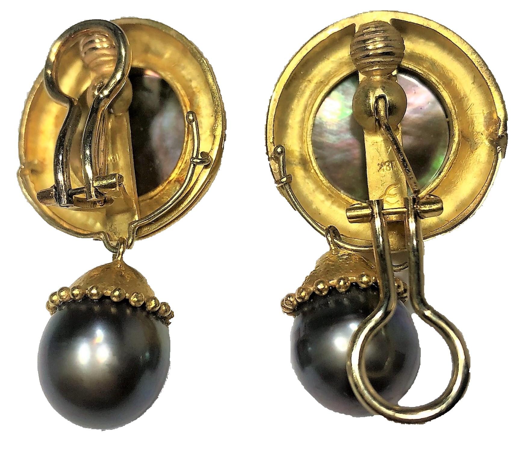 By designer Elizabeth Locke, these handsome 18K yellow gold
and gray pearl earrings are lovely in person. The south sea pearls
hanging at the bottom of the earrings measure 13.5mm. The overall
length is 1 3/4 inches and the width is 1 1/16 inch.