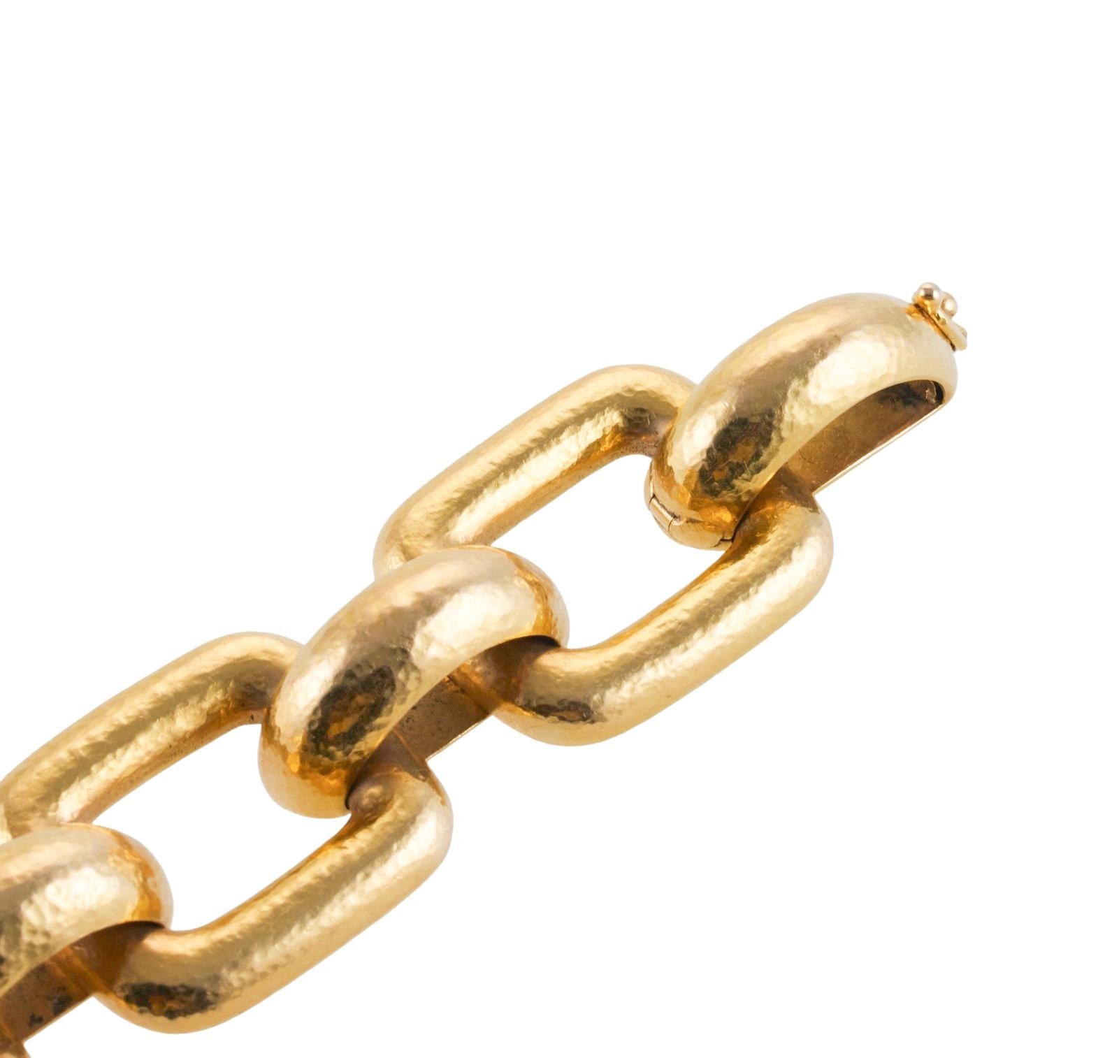 19K yellow gold hammered link beacelet by Elizabeth Locke. Bracelet measures 8