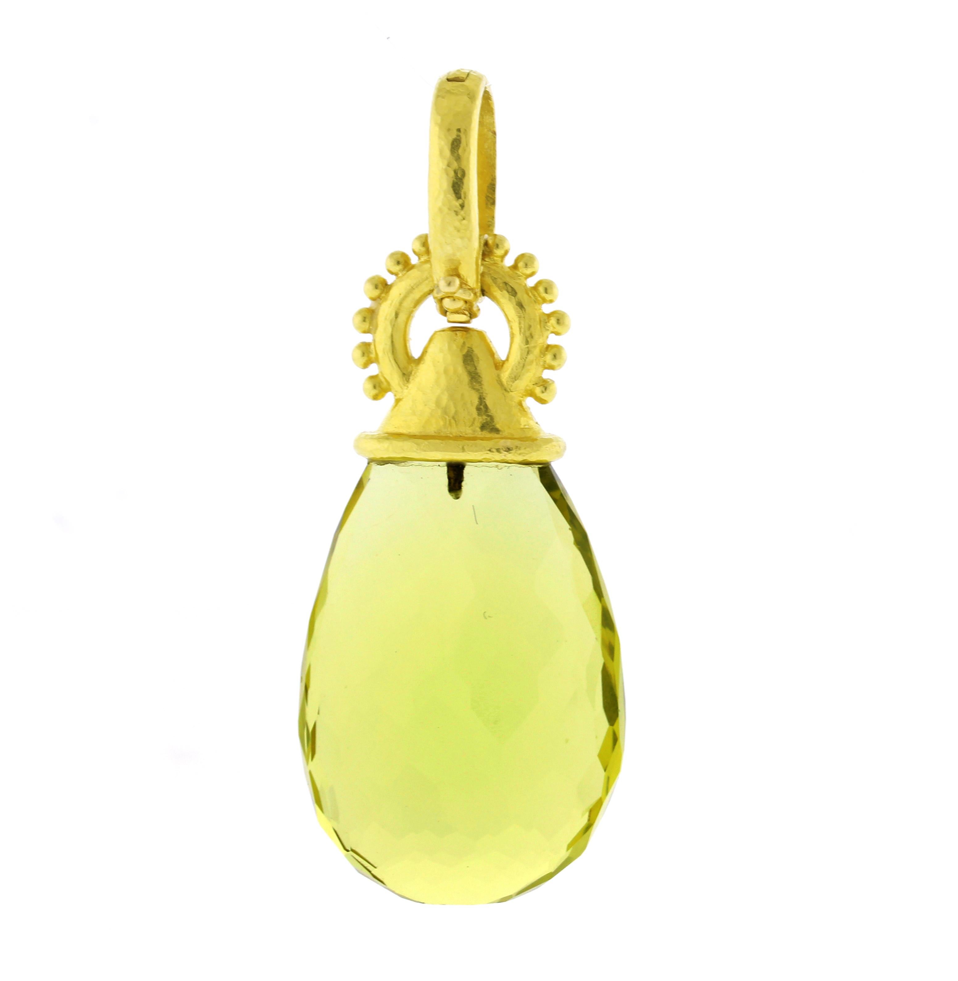 From Elizabeth Locke, a large faceted Prasiolite (Green Quartz) pendant drop set in her signature 19 karat textured gold,. The pendant features a snap bail and measures 2½ inches from top to bottom.
