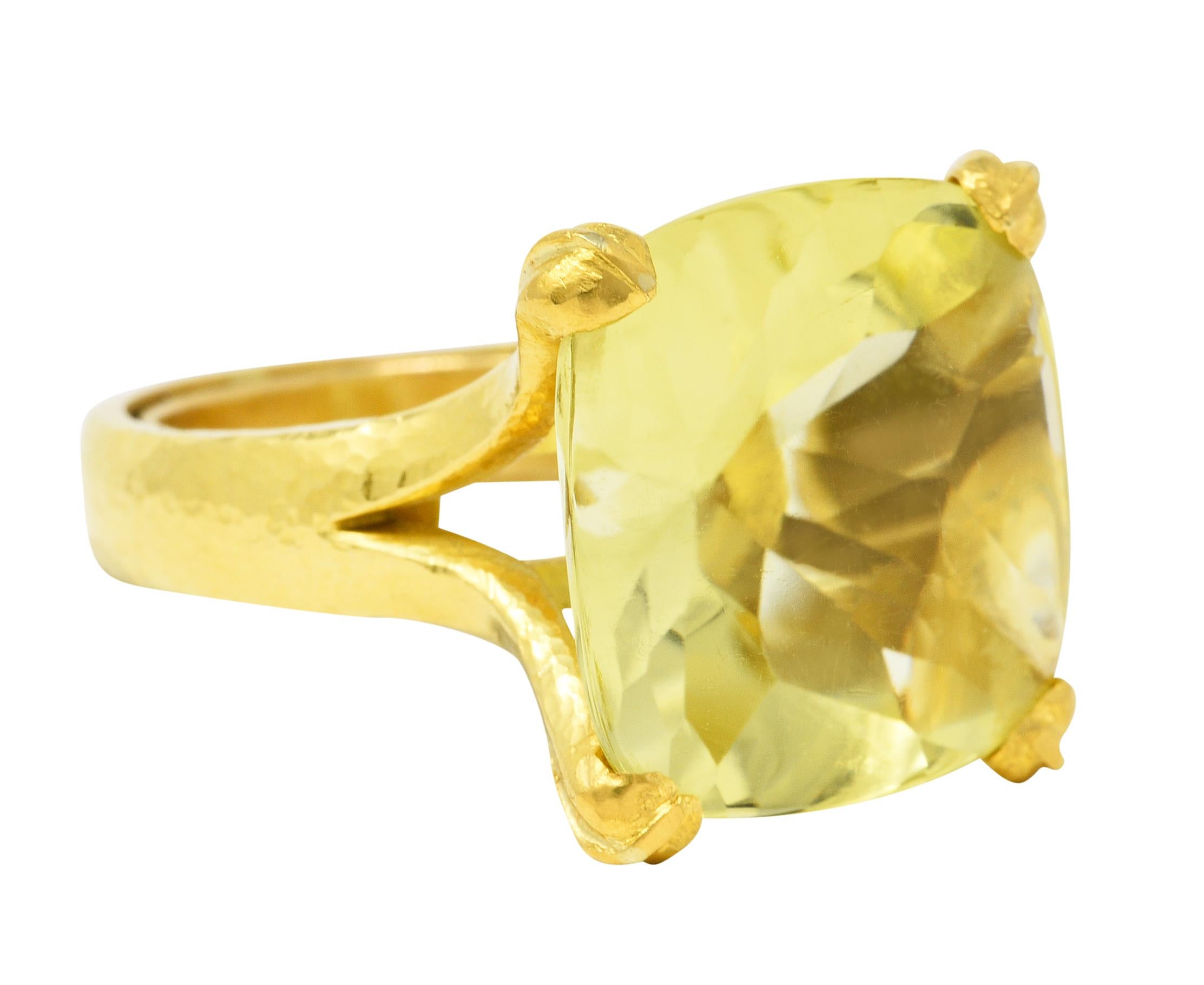 Featuring a cushion buff top of lemon quartz - measuring 19.5 x 19.5 mm

Transparent with vibrant greenish yellow color

Set with prominence by stylized prongs and flanked by dramatically split shoulders

Completed by a hammered finish