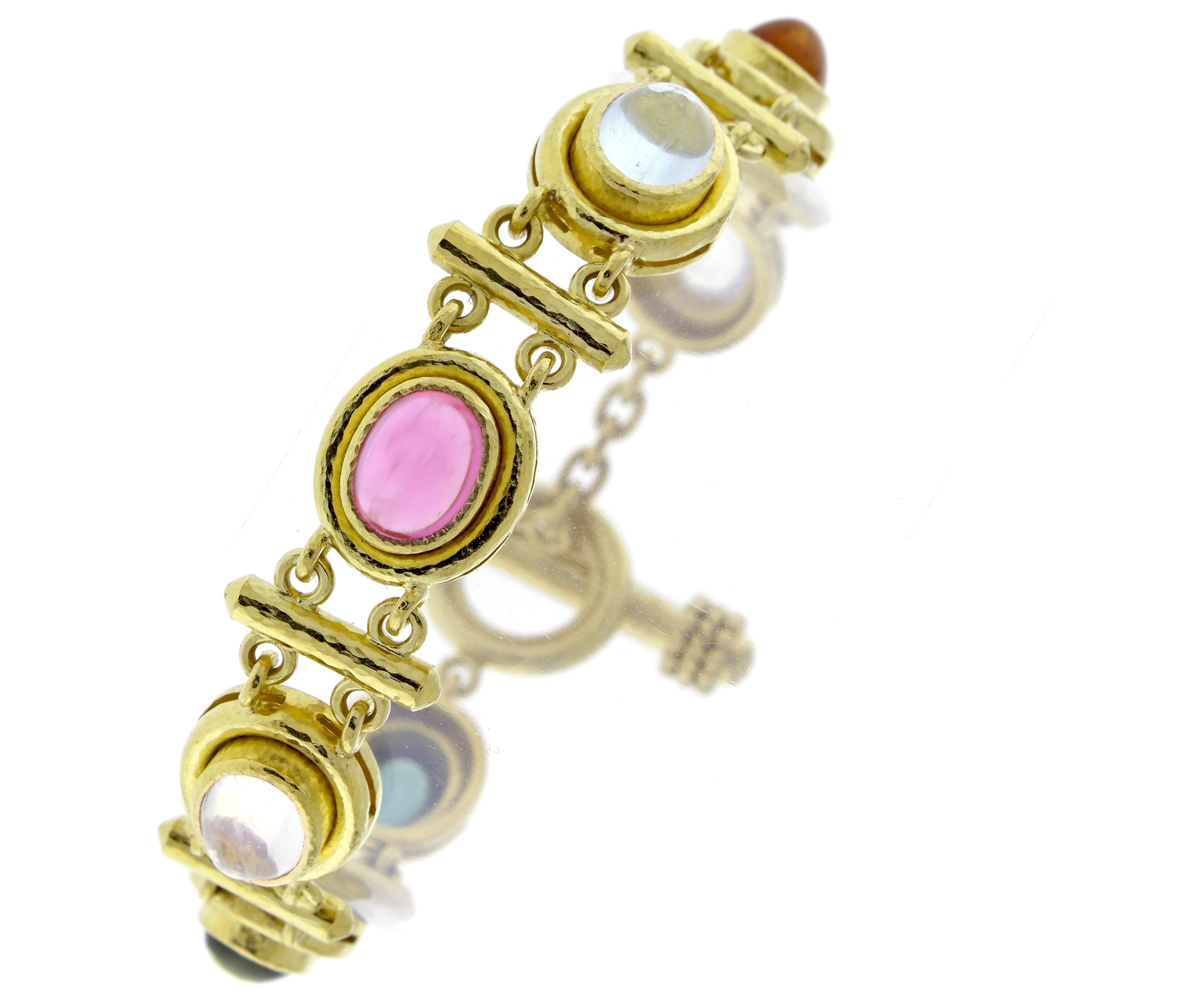From Elizabeth Locke, a toggle bracelet featuring oval cabochon moonstones, citrine and tourmaline.  The cabochon gemstone links measure 12.4*14mm, 7 ¼ inches total length