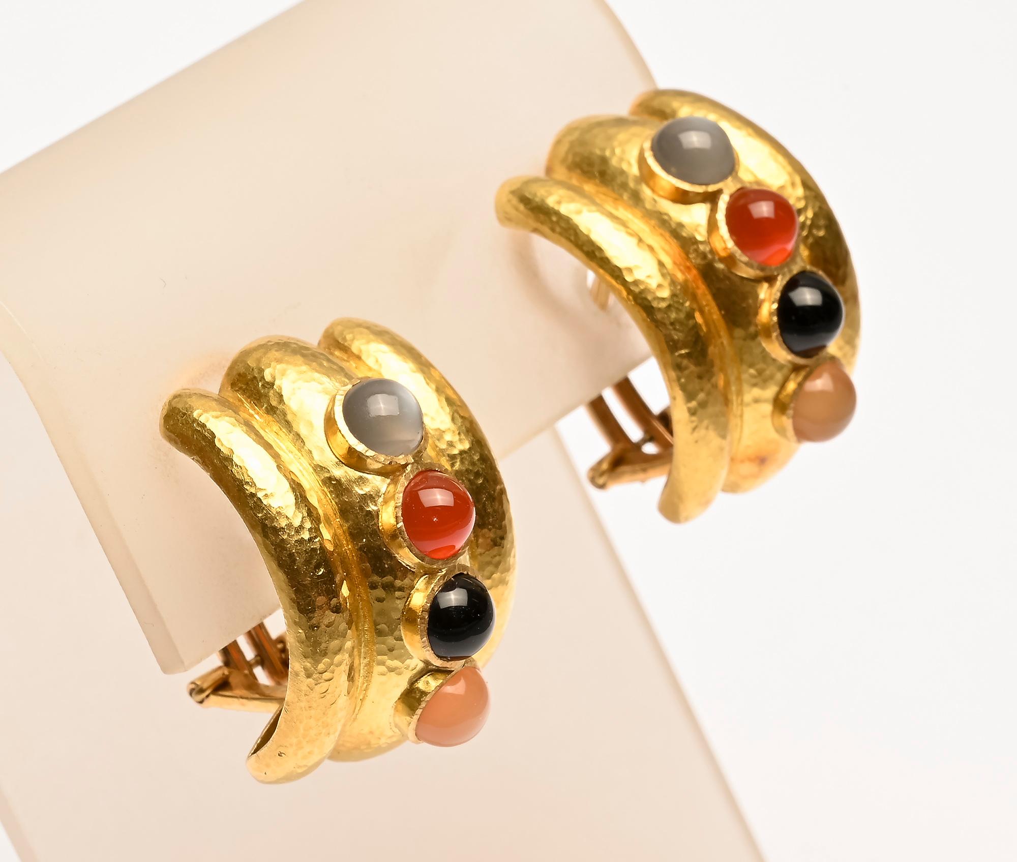 Multicolor half hoop earrings by Elizabeth Locke make it easy to wear them with virtually everything. She combined carnelian; chalcedony; quartz and amethyst for a beautiful rainbow of rich colors. The earrings are 3/4