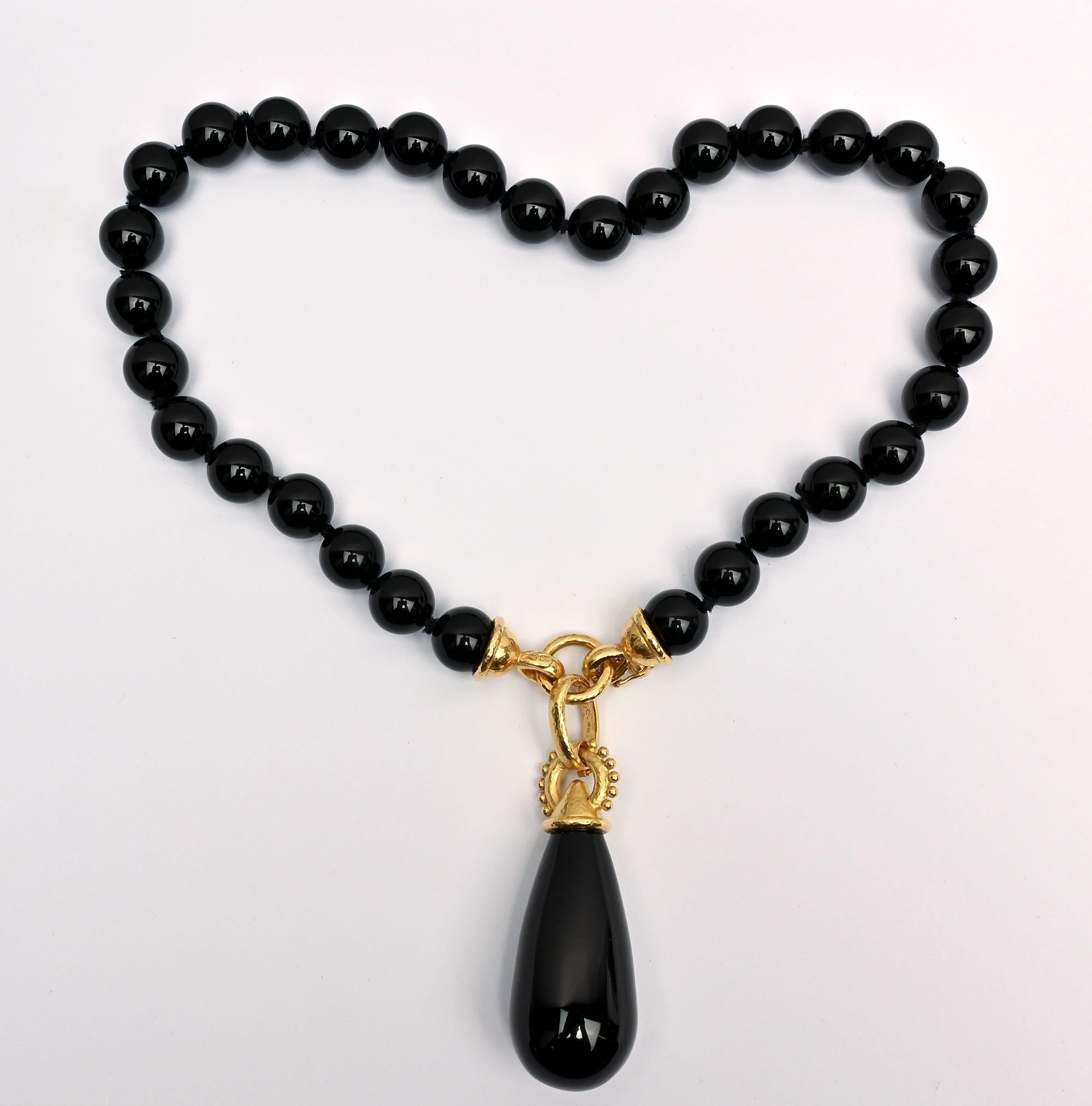 Beautiful pear shaped onyx pendant by Elizabeth Locke. It can be worn on any number of necklaces but came with the onyx beads necklace listed as item 
LU13322796422. The pendant measures 3 inches long  to the top of the bale. It would look equally