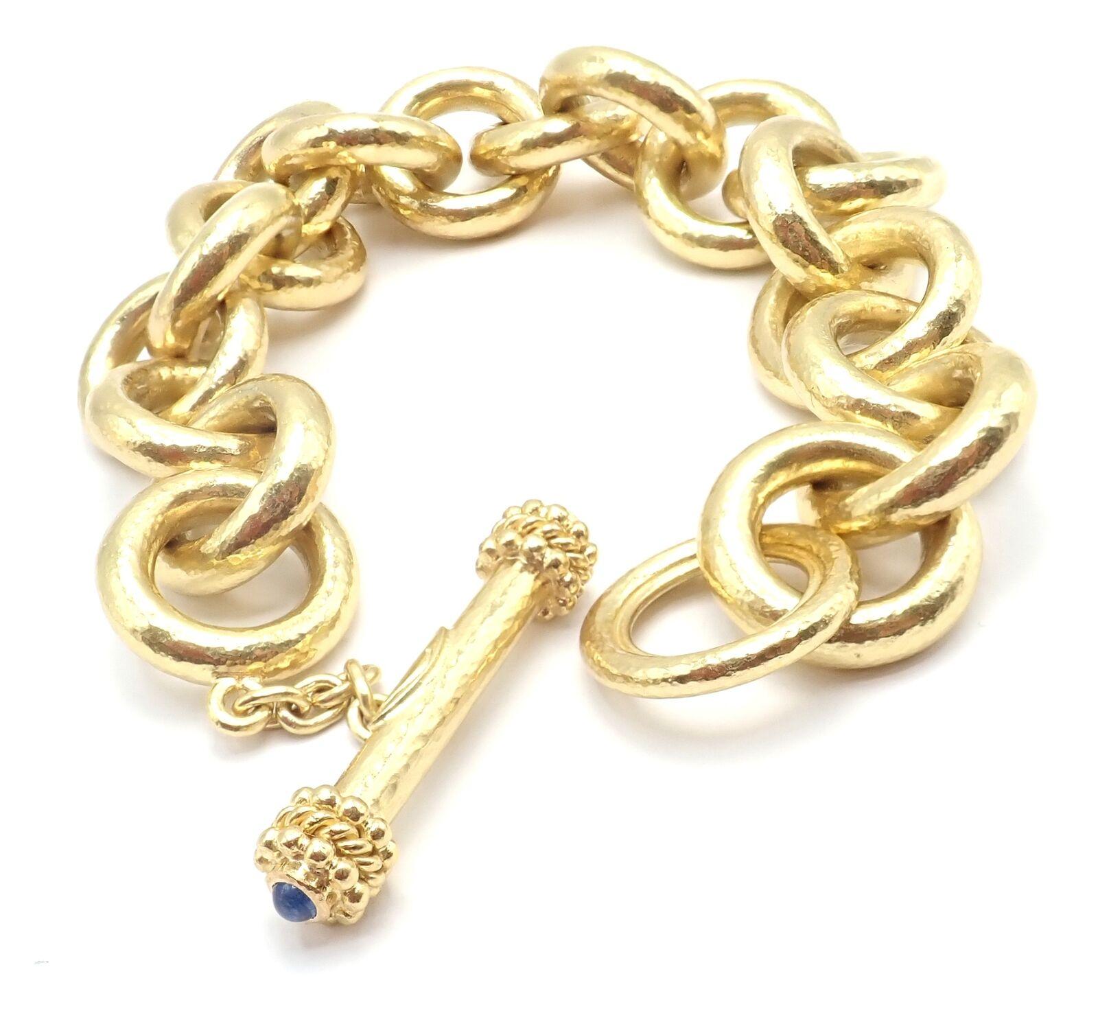 18k Yellow Hammered Gold Sapphire Toggle Link Bracelet by Elizabeth Locke. 
With 2 cabochon sapphires.
Details: 
Length: 8