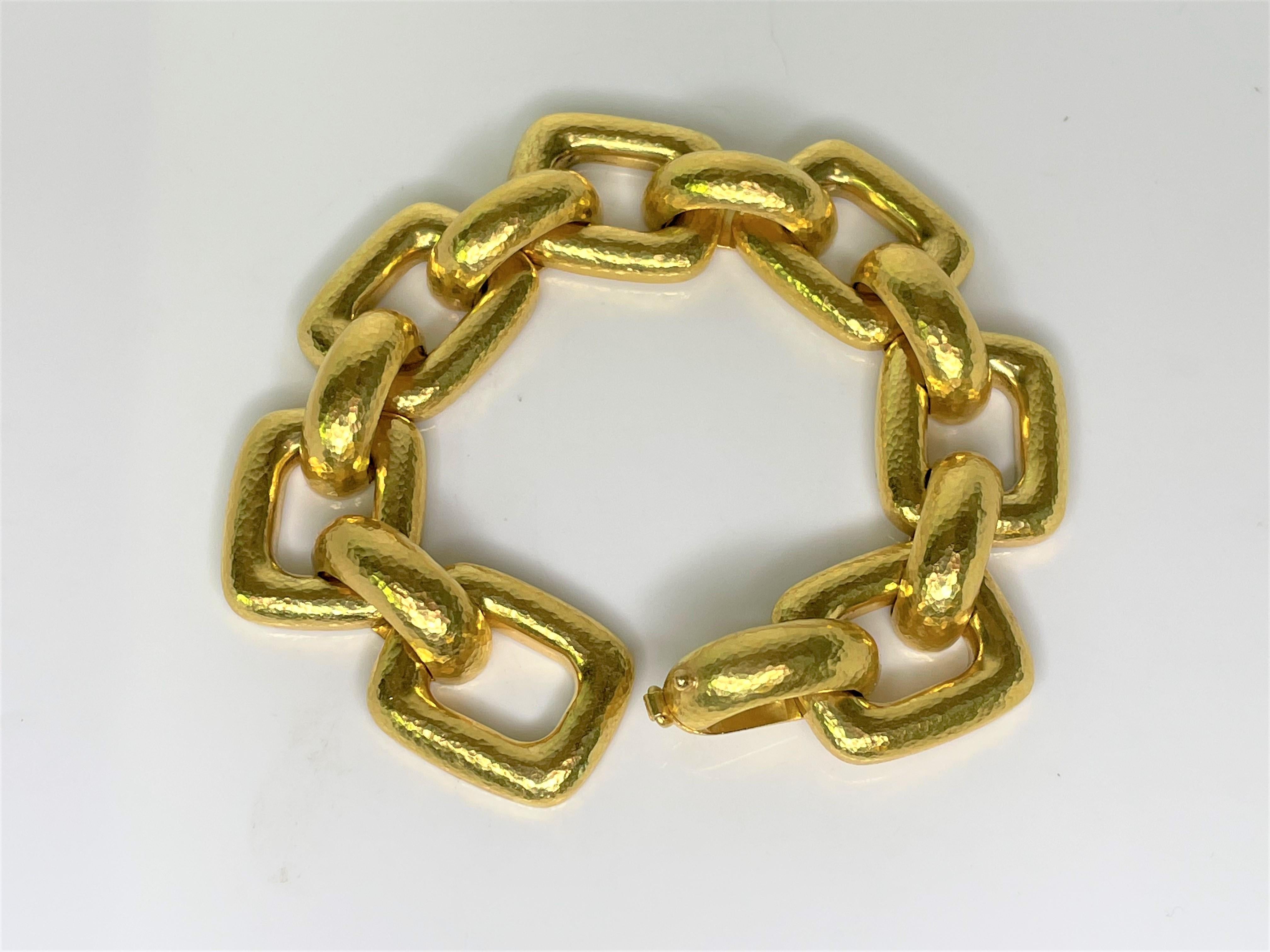 By designer Elizabeth Locke
19 karat solid hammered yellow gold.
8.25 inches long, 0.82 inches wide
Stamped 
