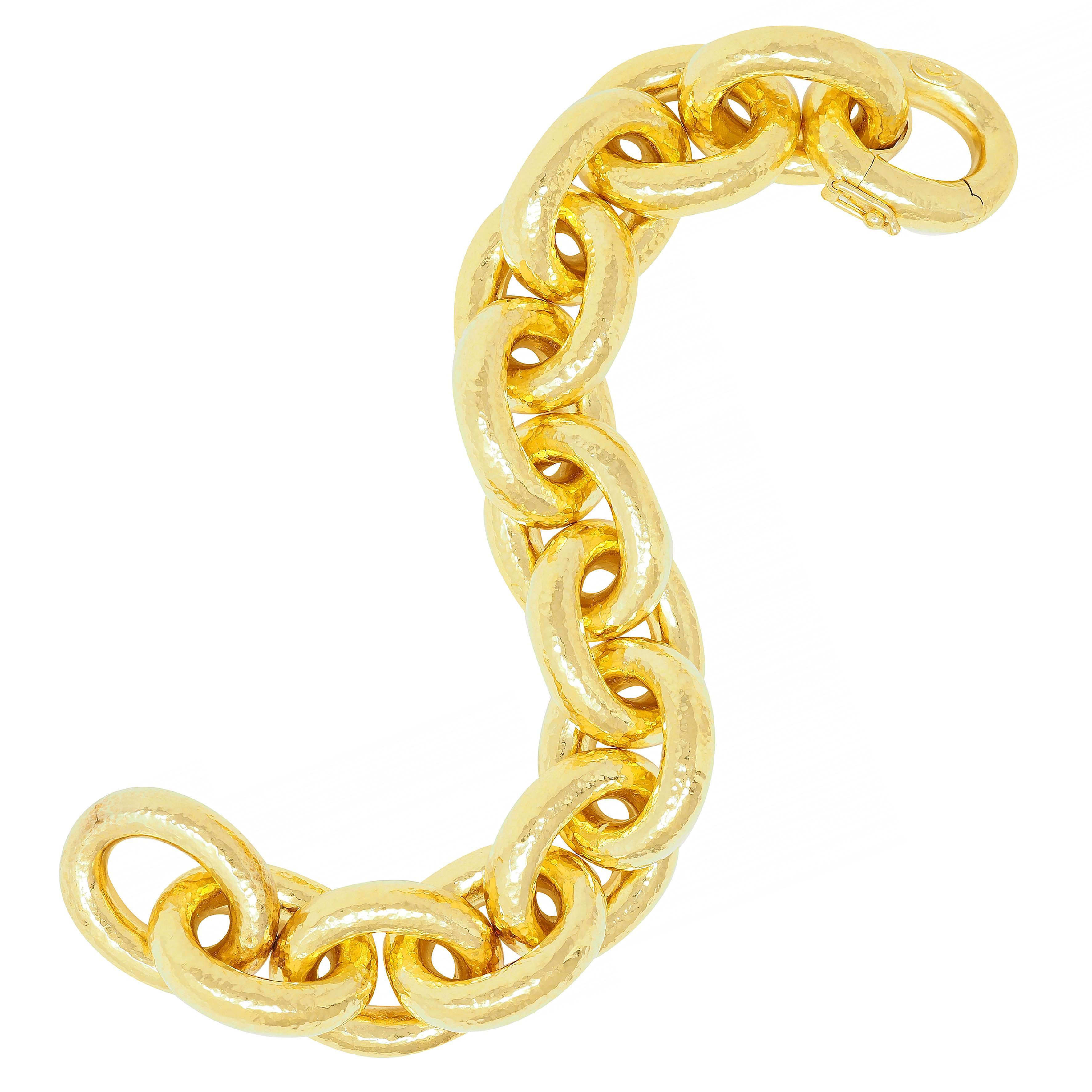 Designed as a large cable link bracelet 
With fine hammered texture throughout
Completed by concealed clasp closure
With figure eight safety
Stamped for 19 karat gold
With maker's mark for Elizabeth Locke
Circa: Late 20th Century 
Width at widest: