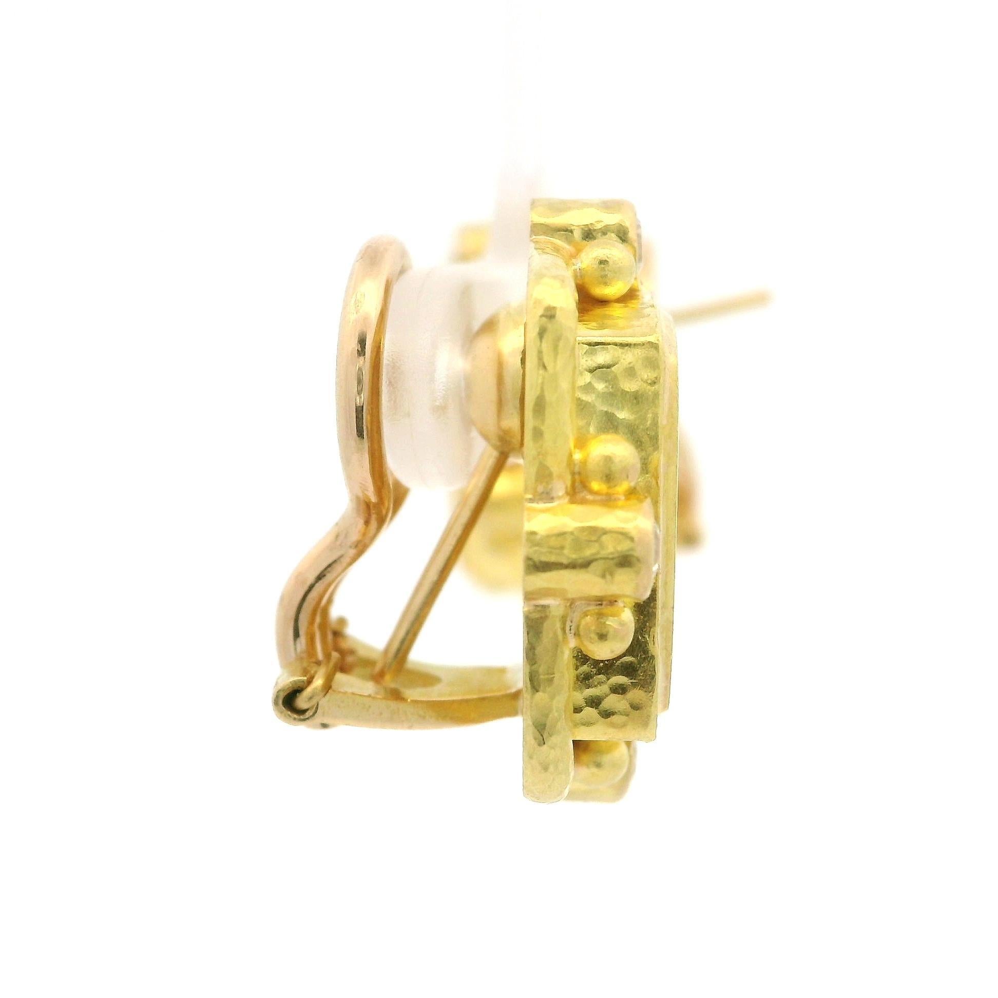 --Stone(s):--
(8) Natural Genuine Diamonds - Round Brilliant Cut - Bezel Set - F Color - VS1 Clarity - 0.47ctw (approx.)

Material: Solid 19k Yellow Gold w/ 18k Backings
Weight: 19.29 Grams
Backing: Swivel Posts w/ Omega Clip On Closures (Pierced