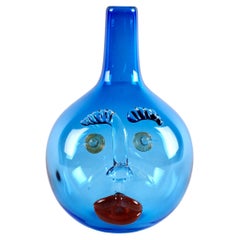 Elizabeth Lyons Hand Blown and Sculpted Glass, Sky Blue Bottle-Head Vessel